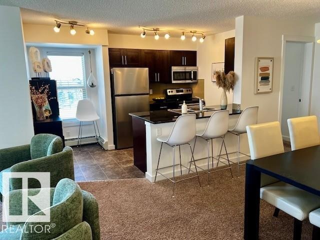 319 5804 Mullen Place, Edmonton, AB - Indoor Photo Showing Kitchen