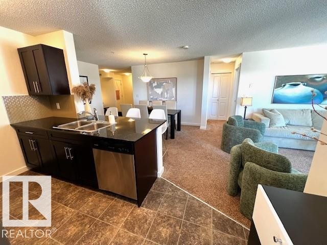 319 5804 Mullen Place, Edmonton, AB - Indoor Photo Showing Kitchen With Double Sink