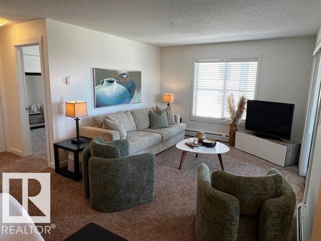 319 5804 Mullen Place, Edmonton, AB - Indoor Photo Showing Living Room