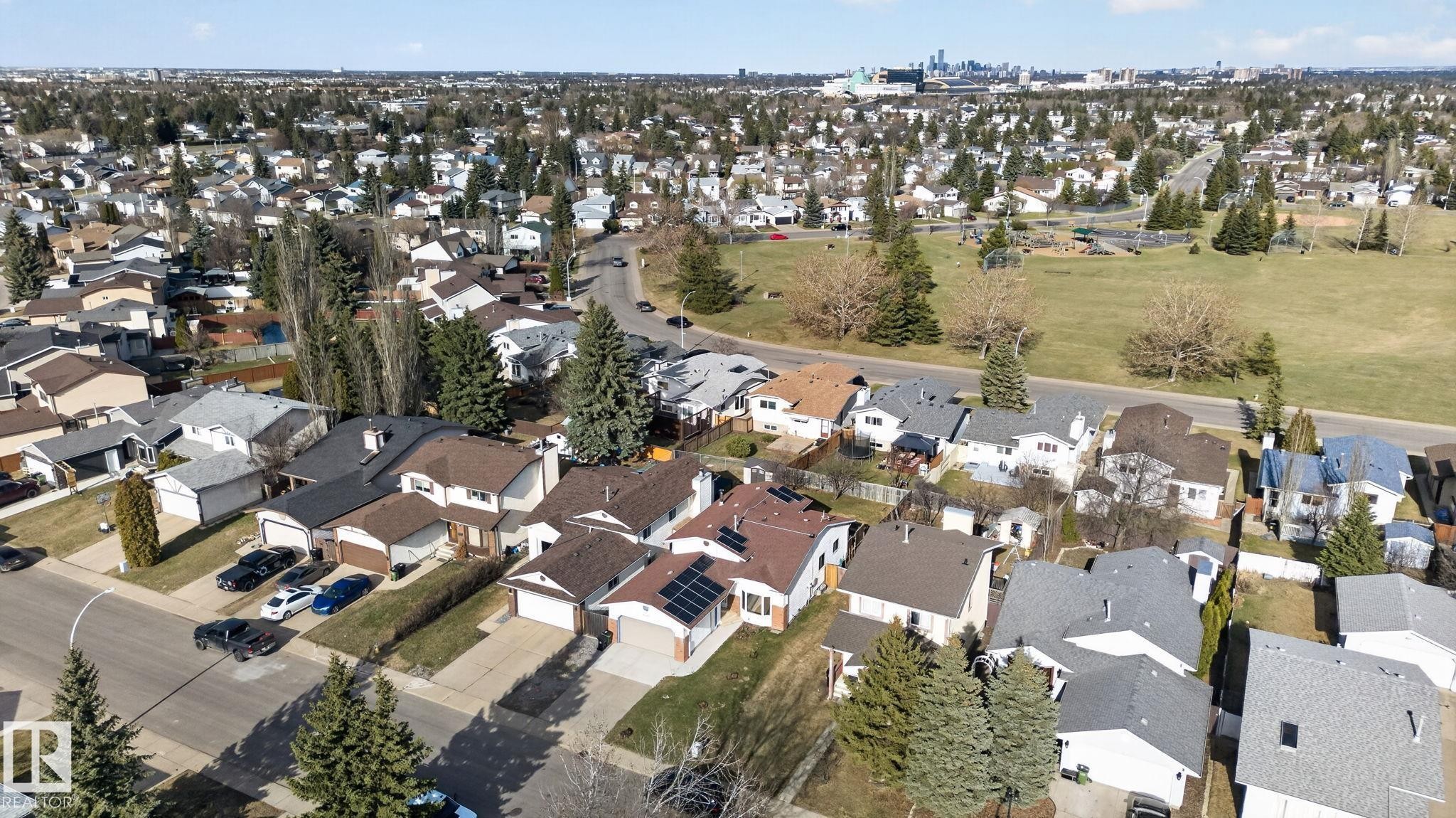 Residential neighborhood featuring a mix of detached homes with varied rooflines and landscaping - 8403 190 Street, Edmonton, AB - Outdoor With View