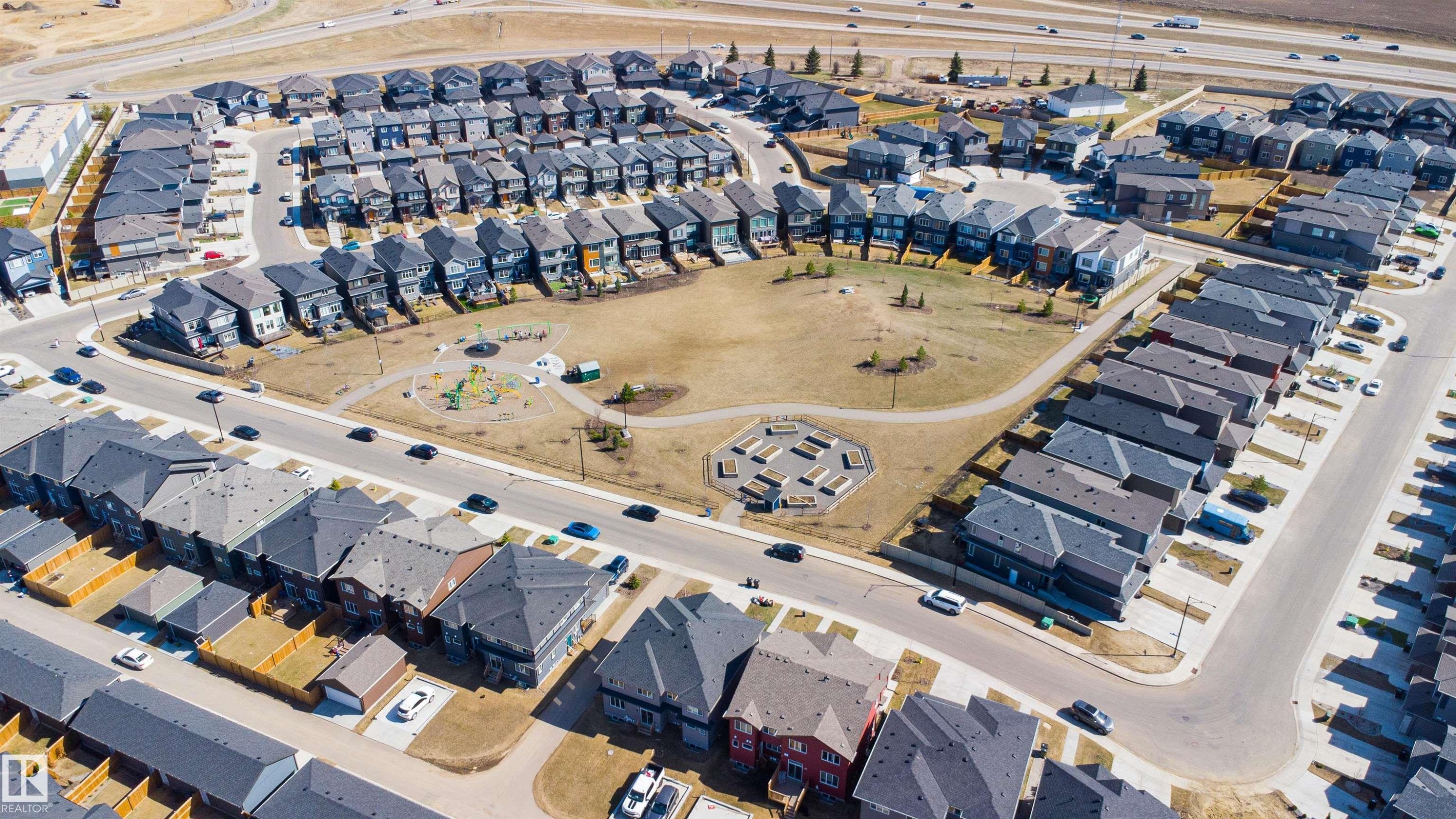 Aerial perspective of a developed residential community featuring detached homes - 1849 Crossbill Loop Nw, Edmonton, AB -