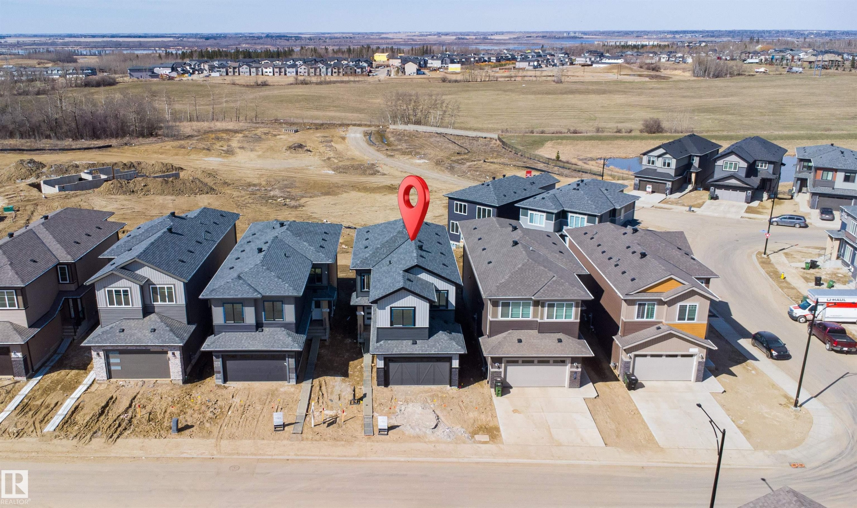Newly constructed two-story residence with an attached single-car garage - 1849 Crossbill Loop Nw, Edmonton, AB - Outdoor