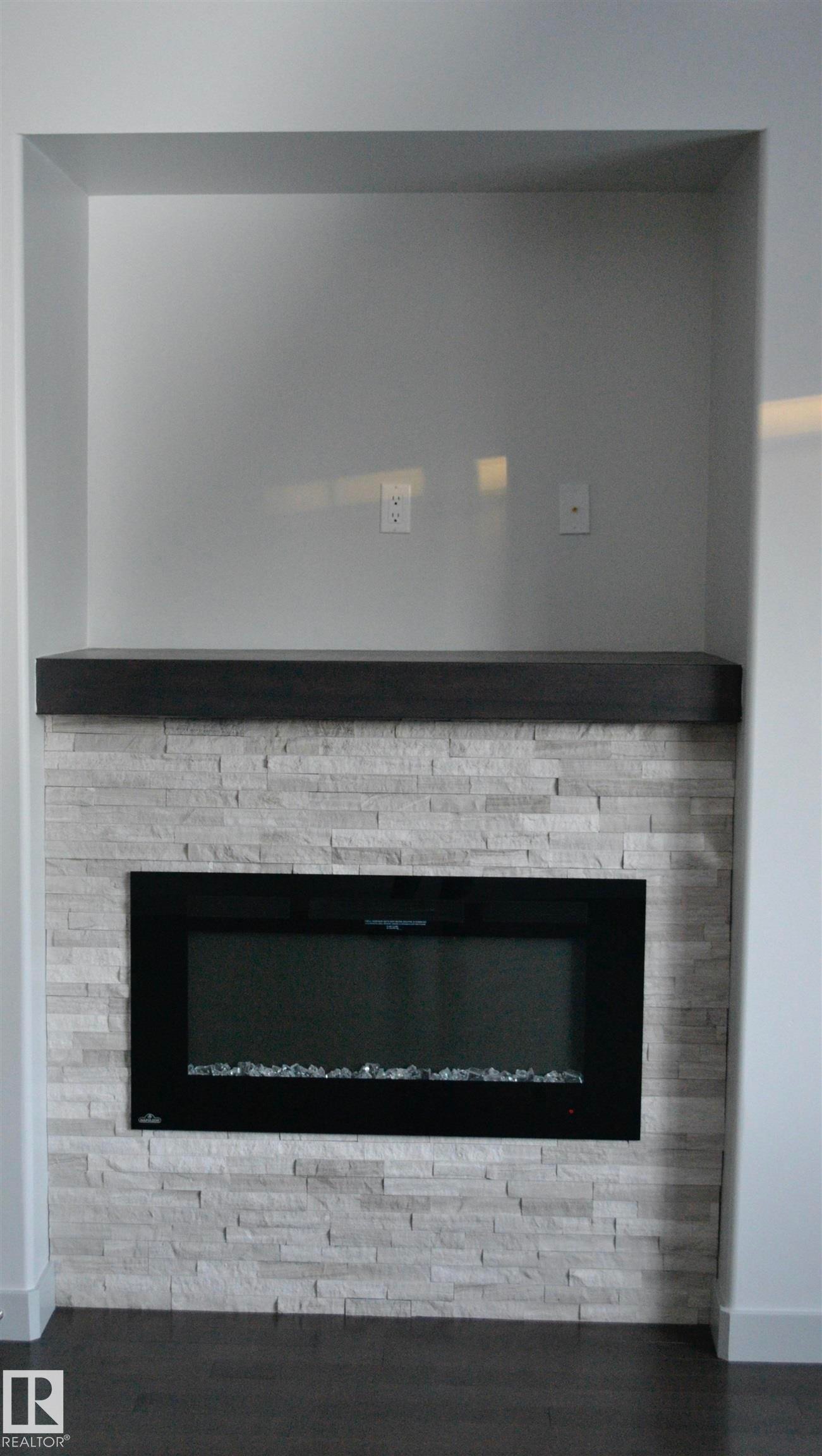 8952 81 Avenue, Edmonton, AB - Indoor Photo Showing Living Room With Fireplace