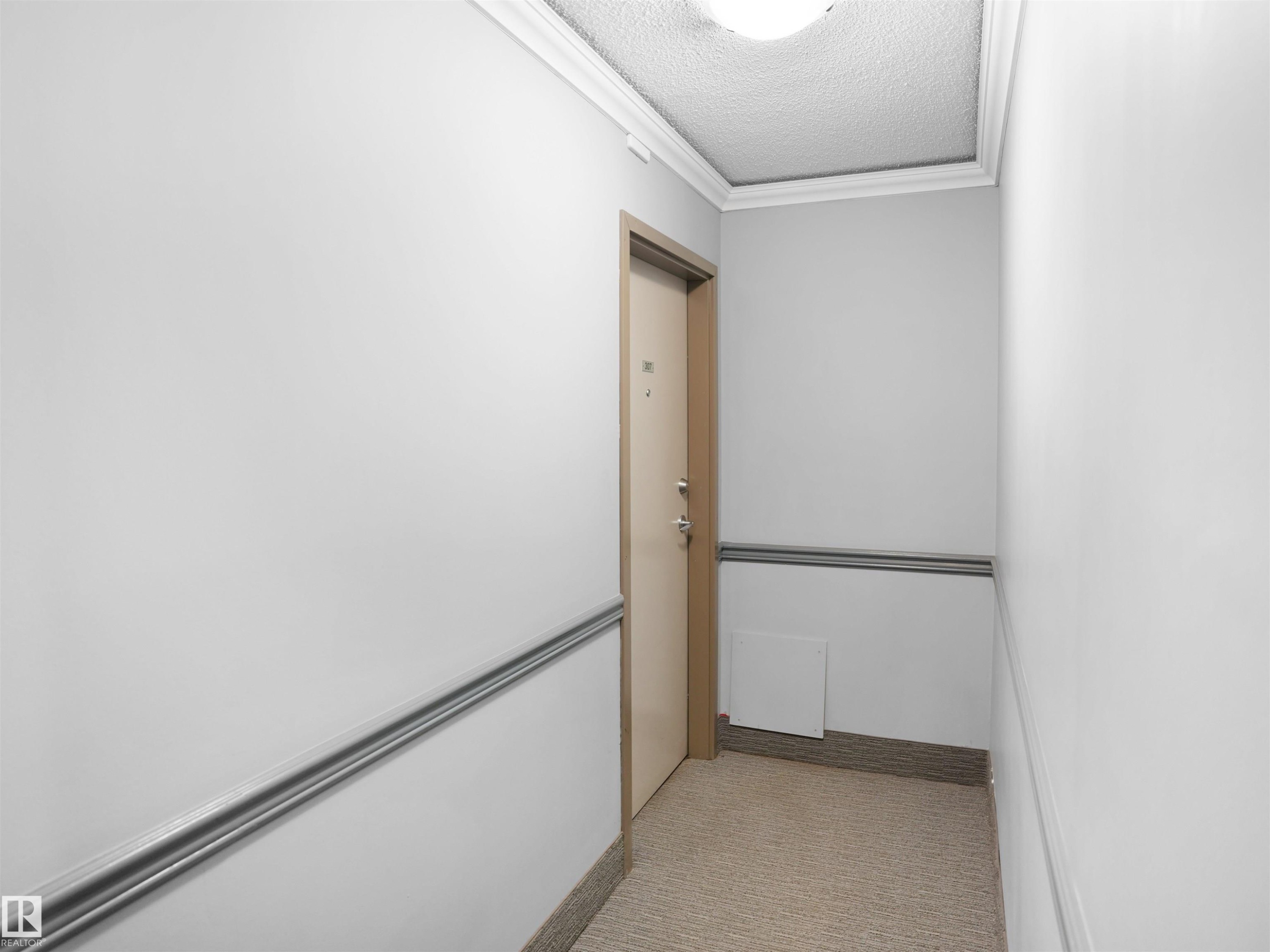 #307 9710 105 St Nw, Edmonton, AB - Indoor Photo Showing Other Room