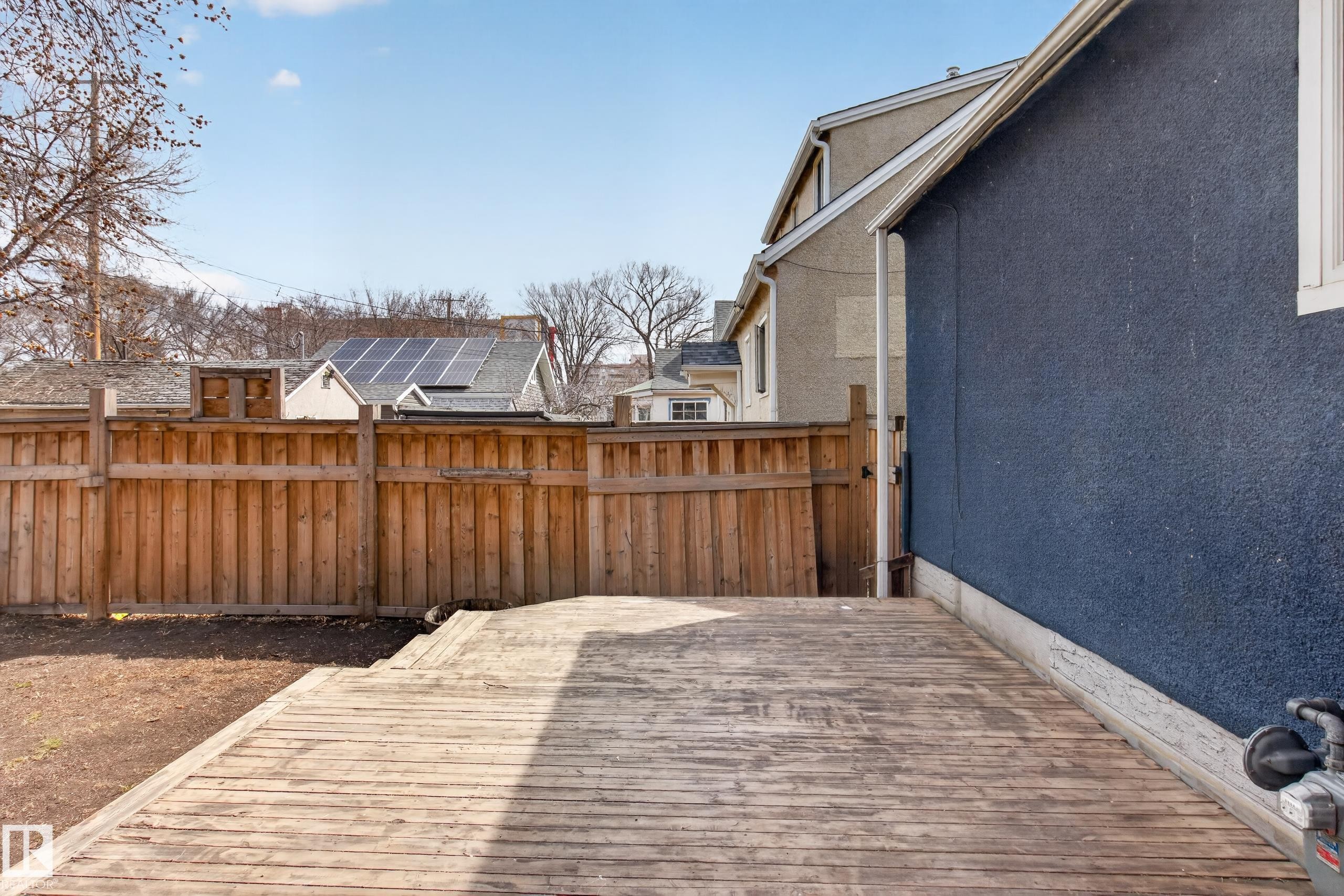 Expansive wooden deck with a privacy fence - 8722 112 Avenue, Edmonton, AB - Outdoor