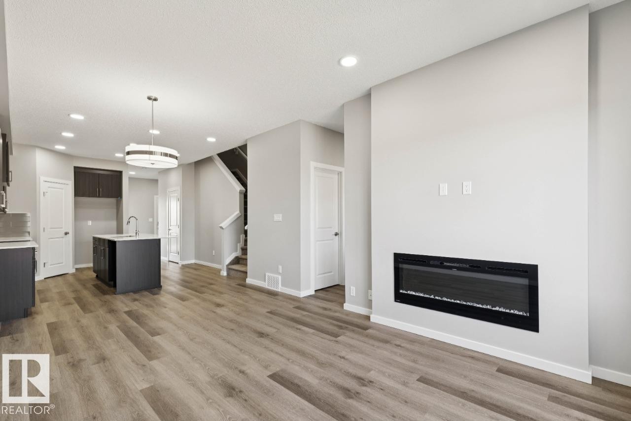309 Edgemont Drive, Edmonton, AB - Indoor Photo Showing Living Room With Fireplace
