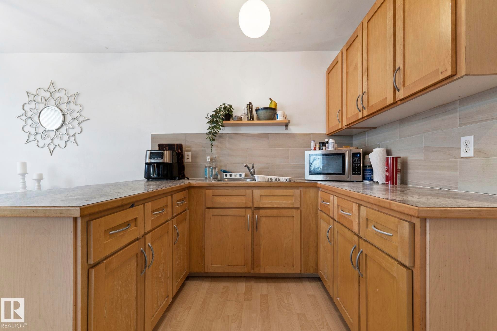 12210 92 Street, Edmonton, AB - Indoor Photo Showing Kitchen With Double Sink