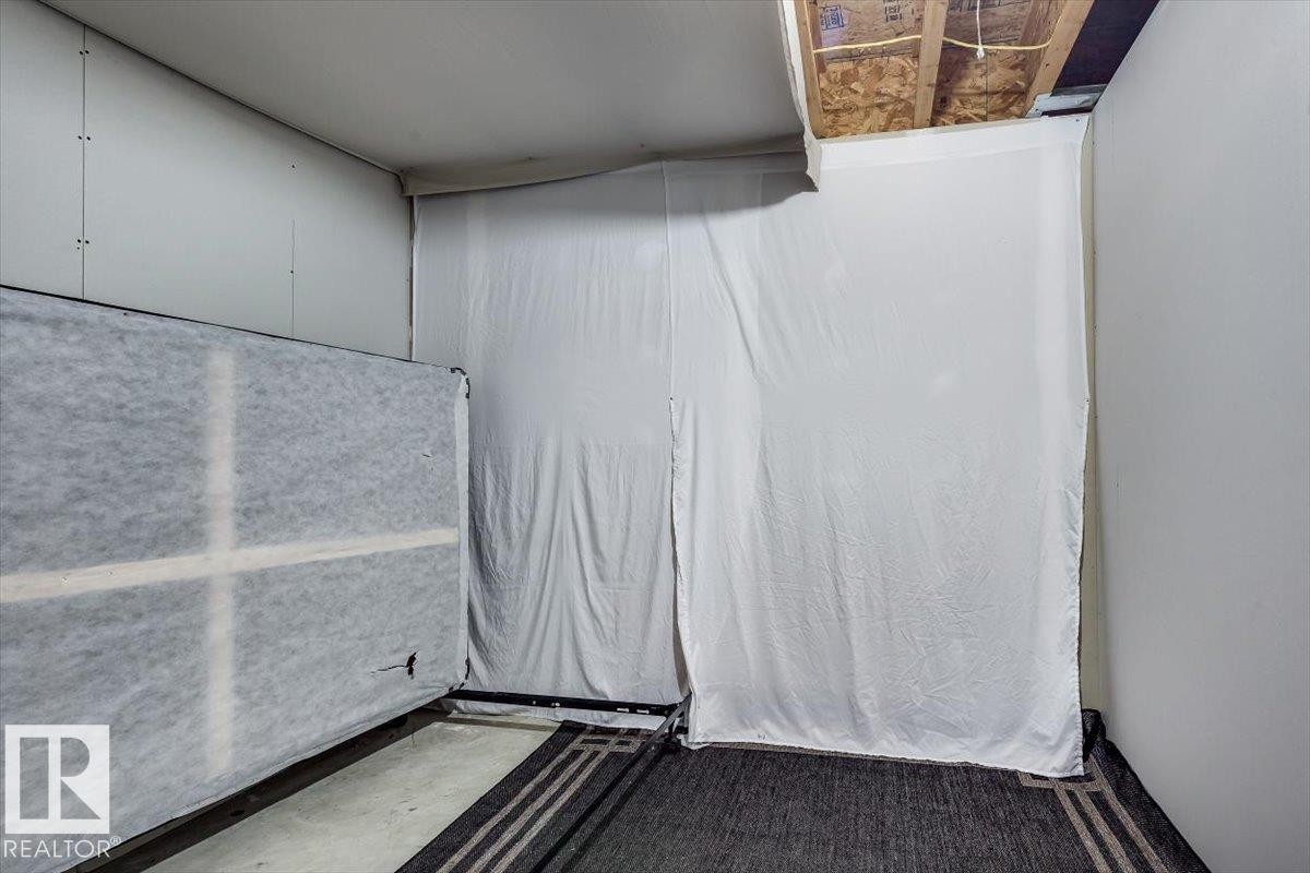 #111 50 Lucky Pl, Sylvan Lake, AB - Indoor Photo Showing Other Room