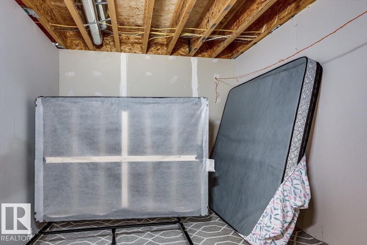 #111 50 Lucky Pl, Sylvan Lake, AB - Indoor Photo Showing Basement