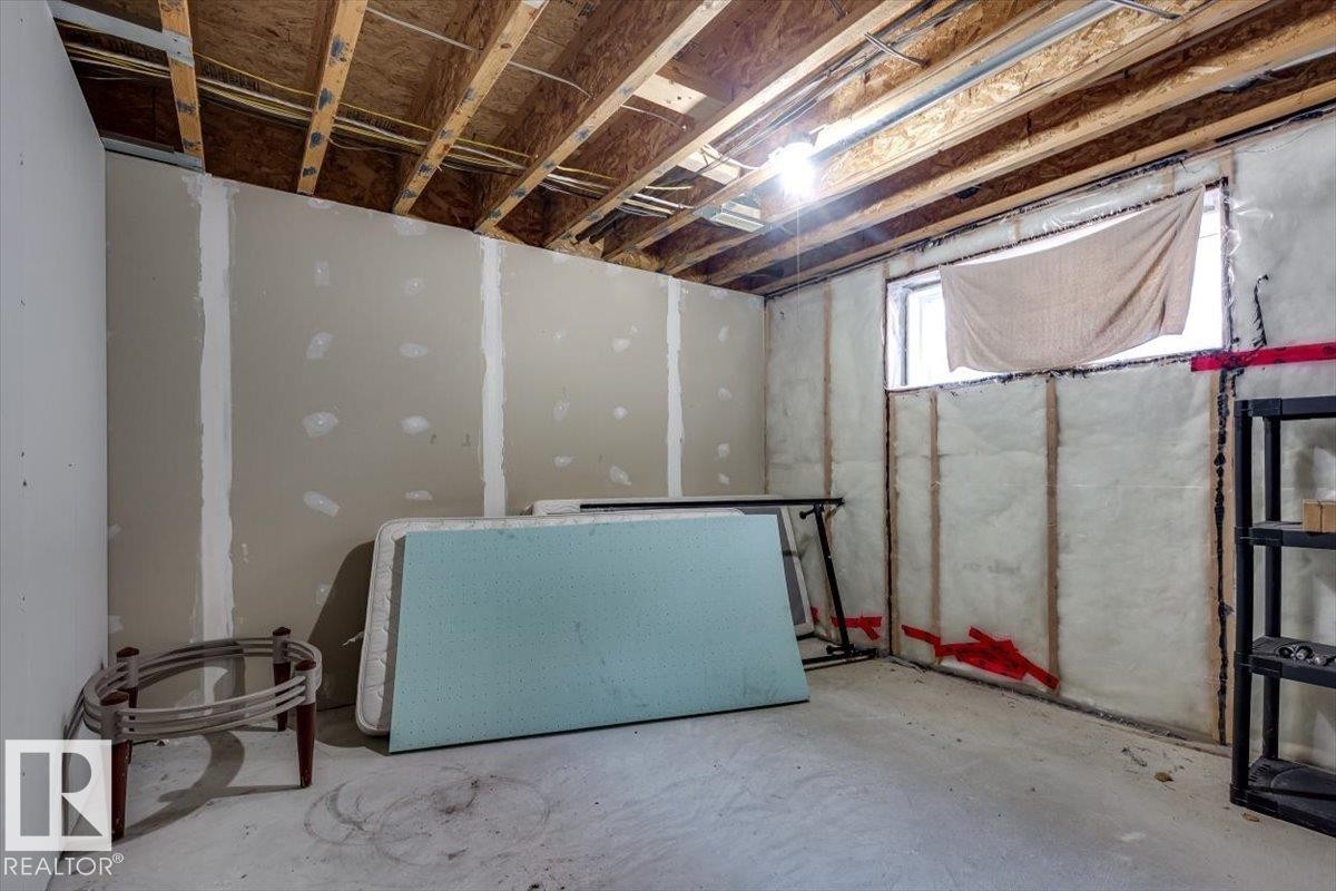#111 50 Lucky Pl, Sylvan Lake, AB - Indoor Photo Showing Basement
