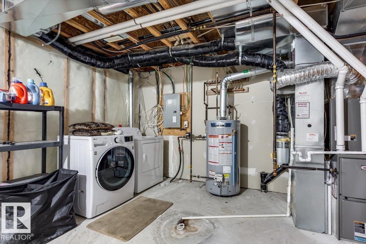 #111 50 Lucky Pl, Sylvan Lake, AB - Indoor Photo Showing Laundry Room