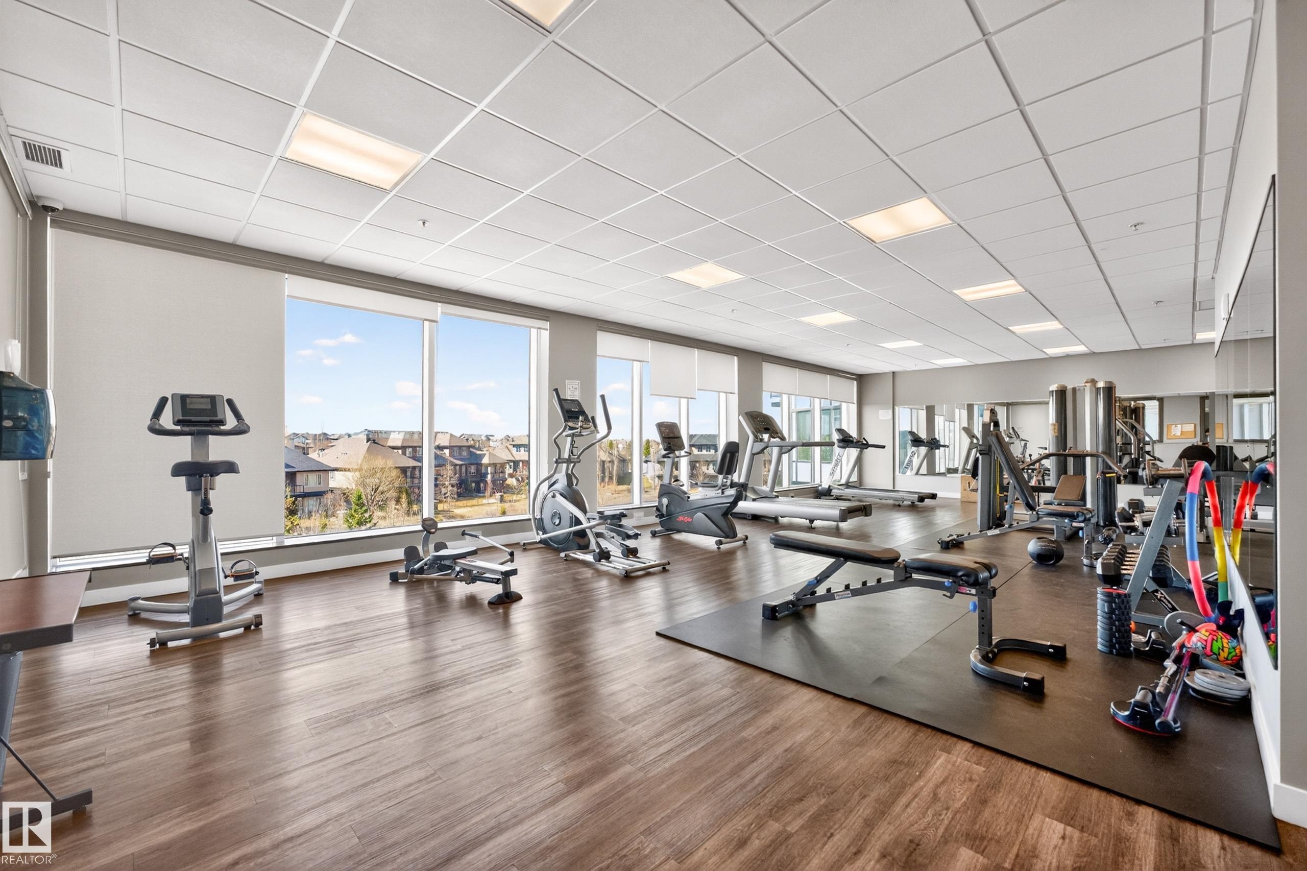 109 5151 Windermere Boulevard, Edmonton, AB - Indoor Photo Showing Gym Room