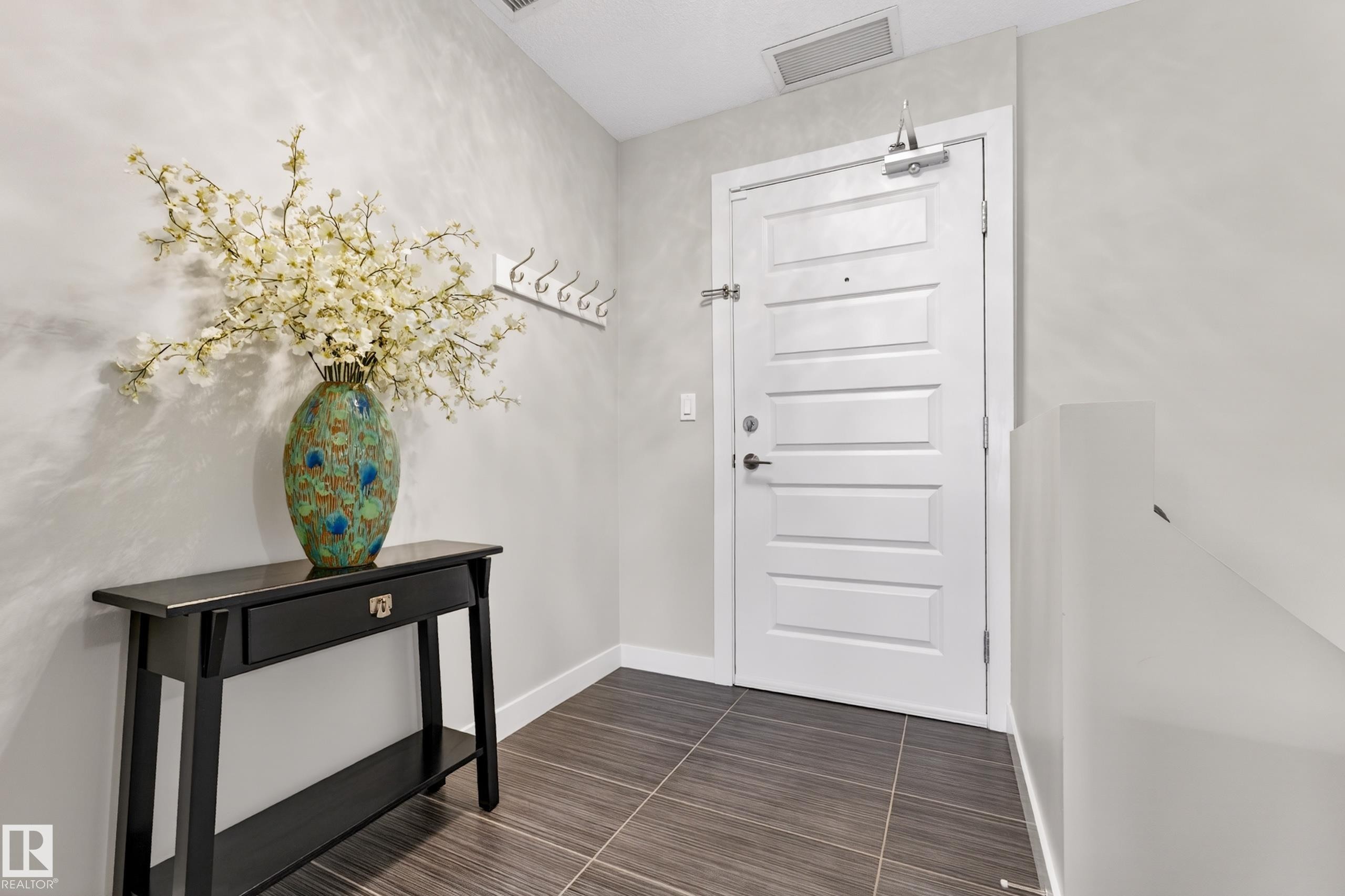 109 5151 Windermere Boulevard, Edmonton, AB - Indoor Photo Showing Other Room