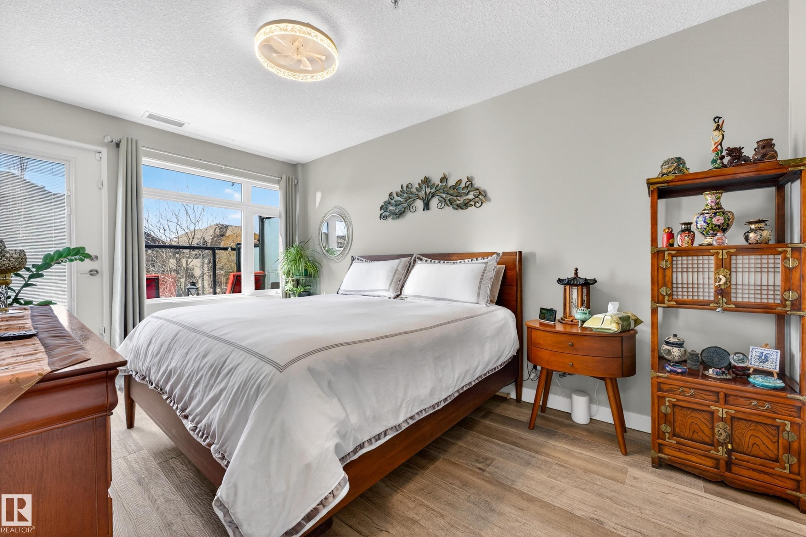 109 5151 Windermere Boulevard, Edmonton, AB - Indoor Photo Showing Bedroom