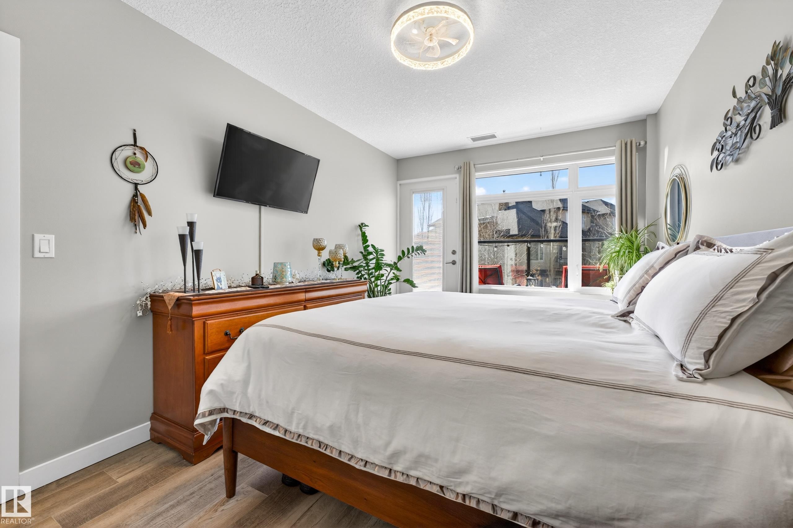 109 5151 Windermere Boulevard, Edmonton, AB - Indoor Photo Showing Bedroom
