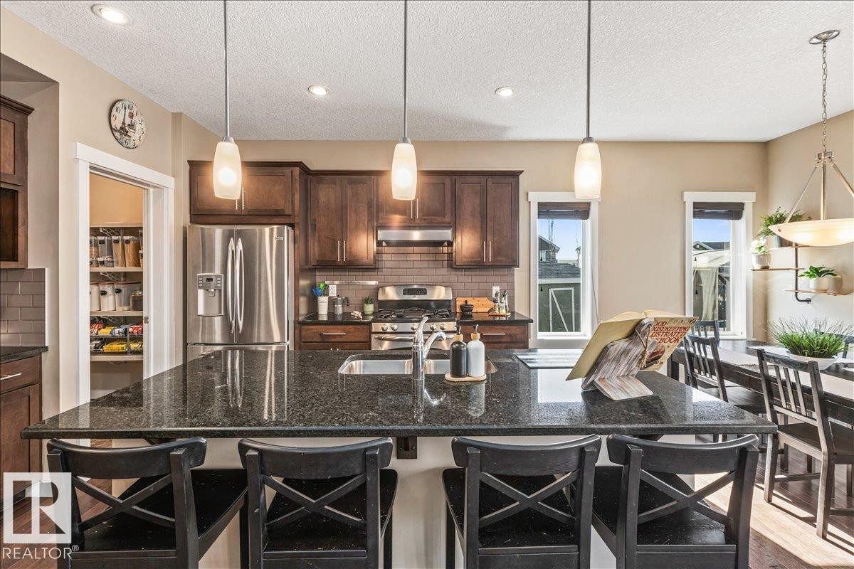 2108 77 Street, Edmonton, AB - Indoor Photo Showing Living Room With Fireplace