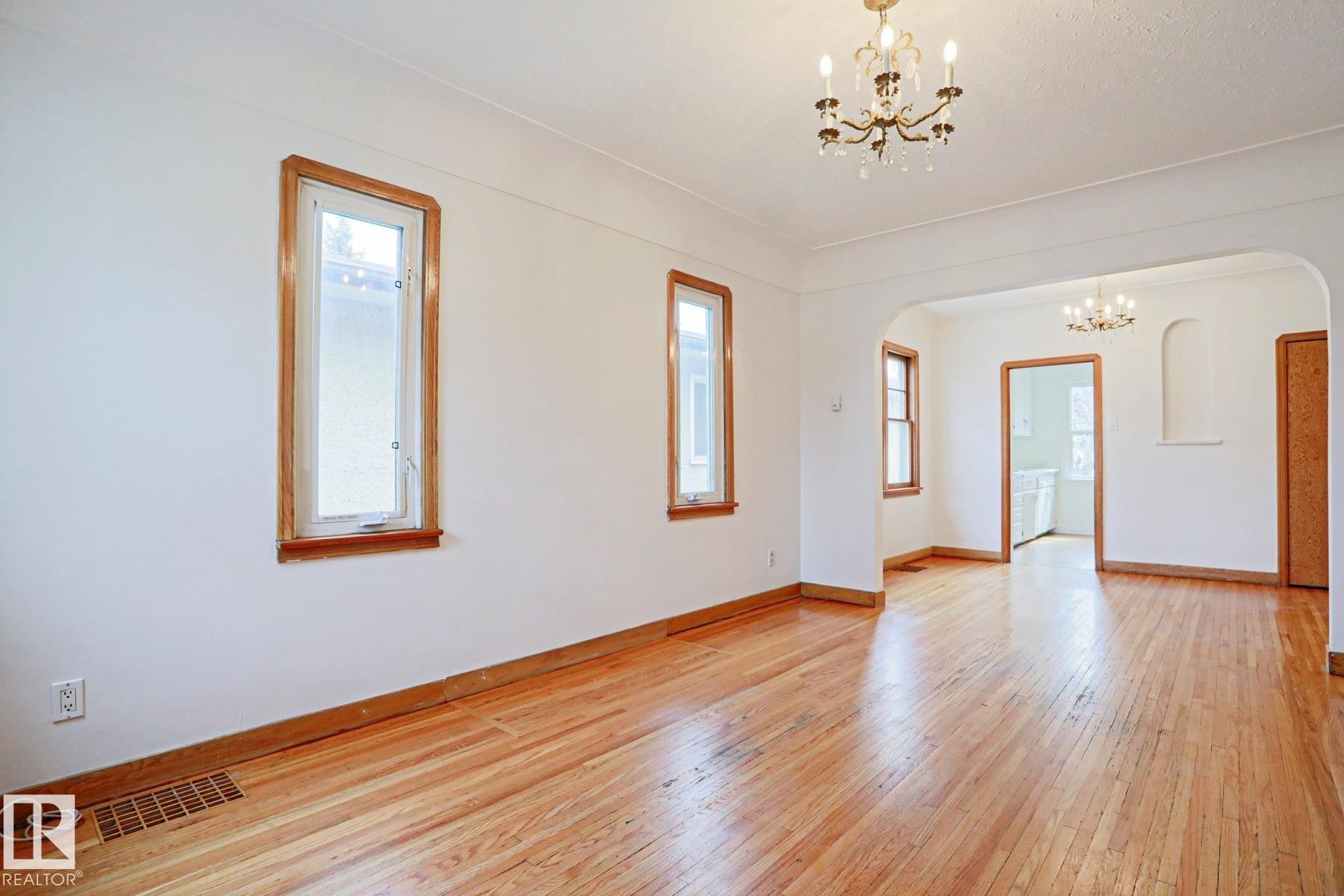 Hardwood flooring extending throughout the space - 9611 81 Avenue, Edmonton, AB - Indoor Photo Showing Other Room