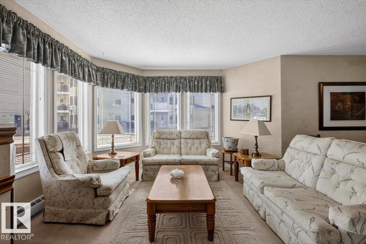 105 5212 25 Avenue Nw, Edmonton, AB - Indoor Photo Showing Living Room