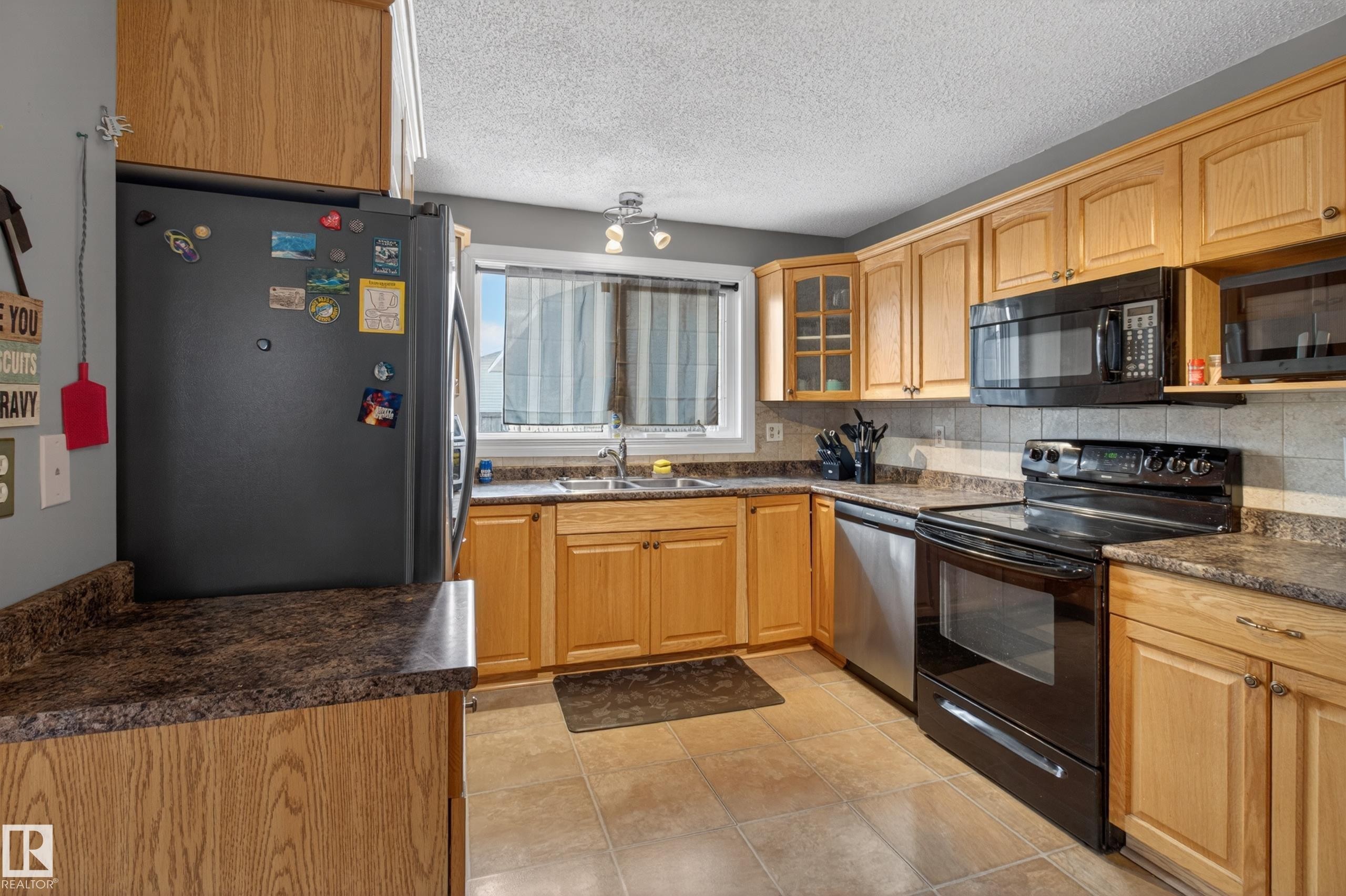 47 Duke Drive, Lamont, AB - Indoor Photo Showing Kitchen With Double Sink