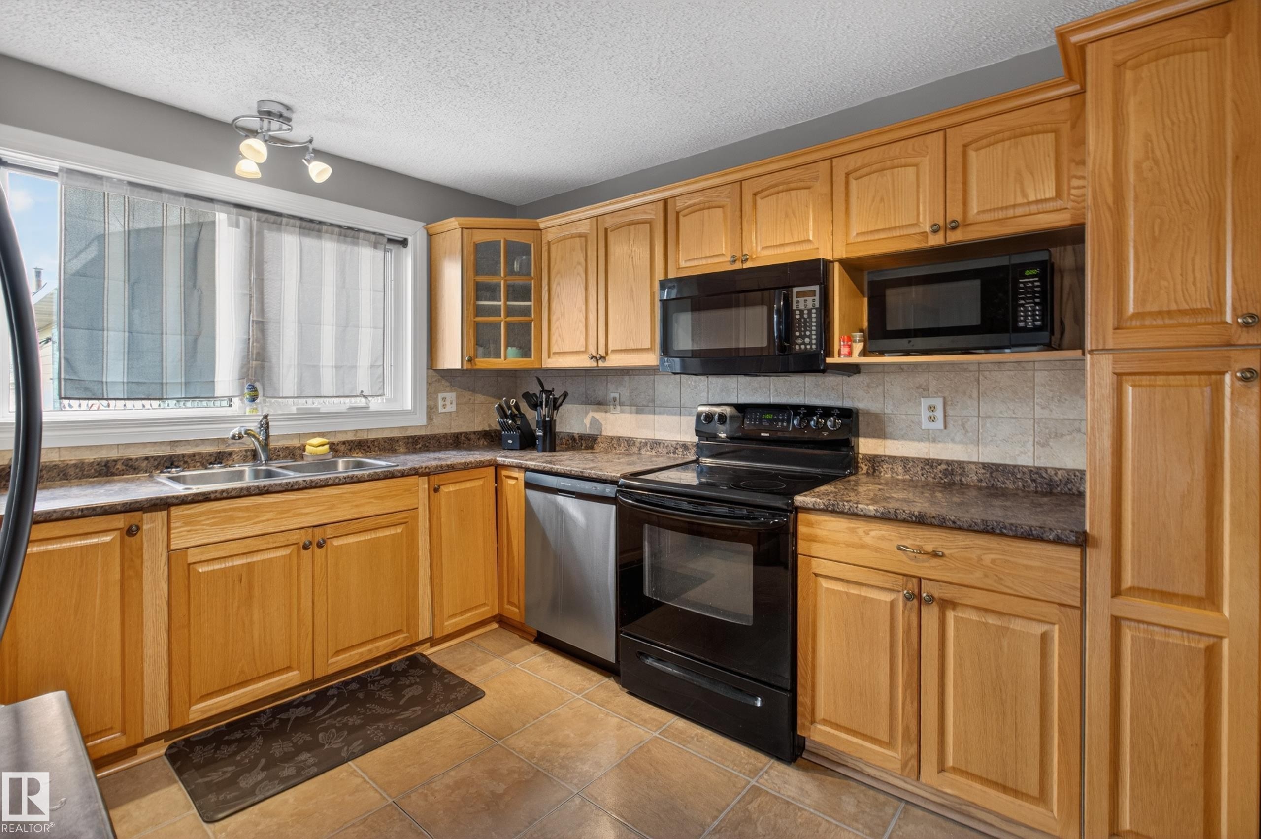 47 Duke Drive, Lamont, AB - Indoor Photo Showing Kitchen With Double Sink