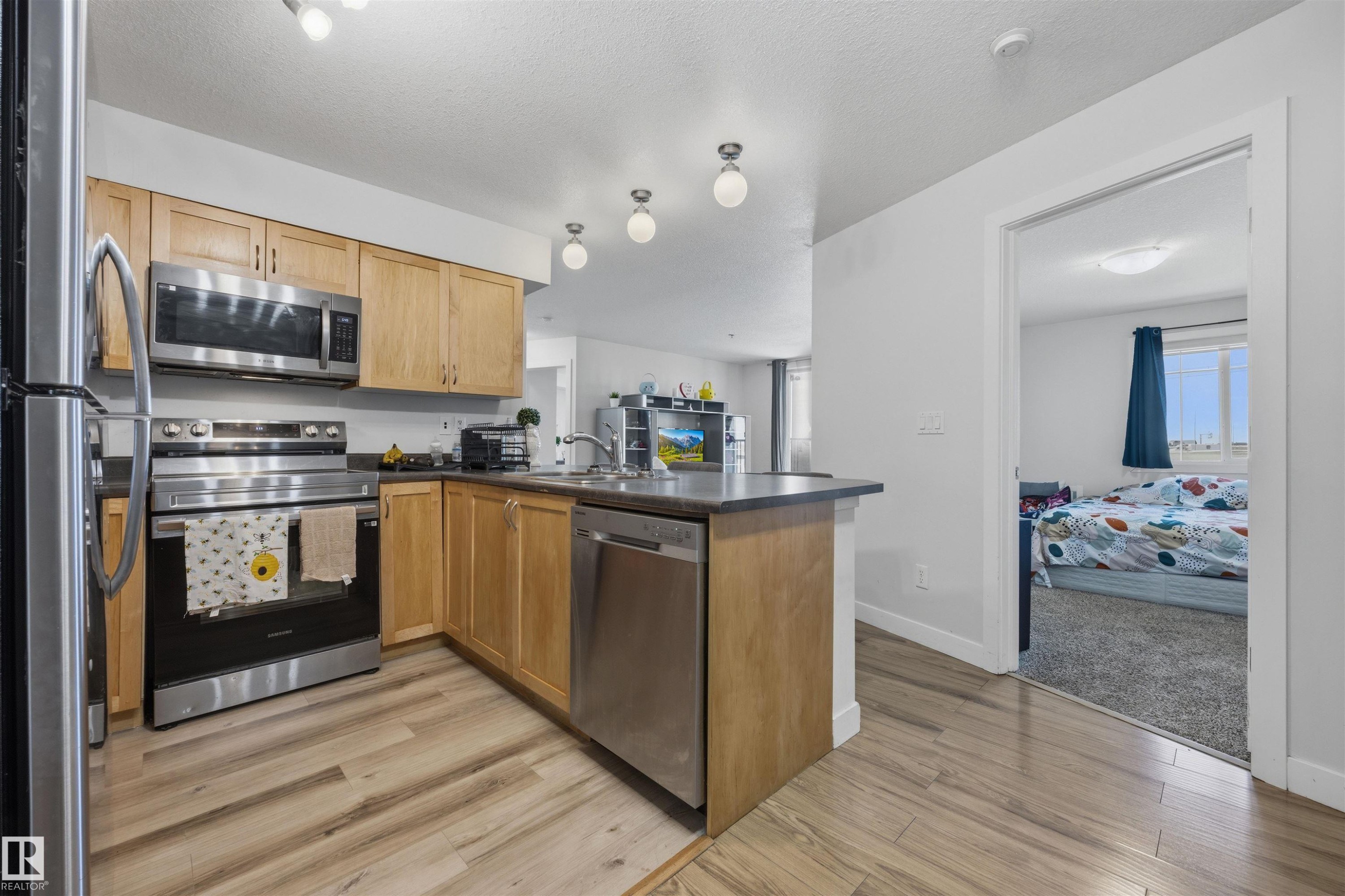 116 920 156 Street, Edmonton, AB - Indoor Photo Showing Kitchen With Stainless Steel Kitchen