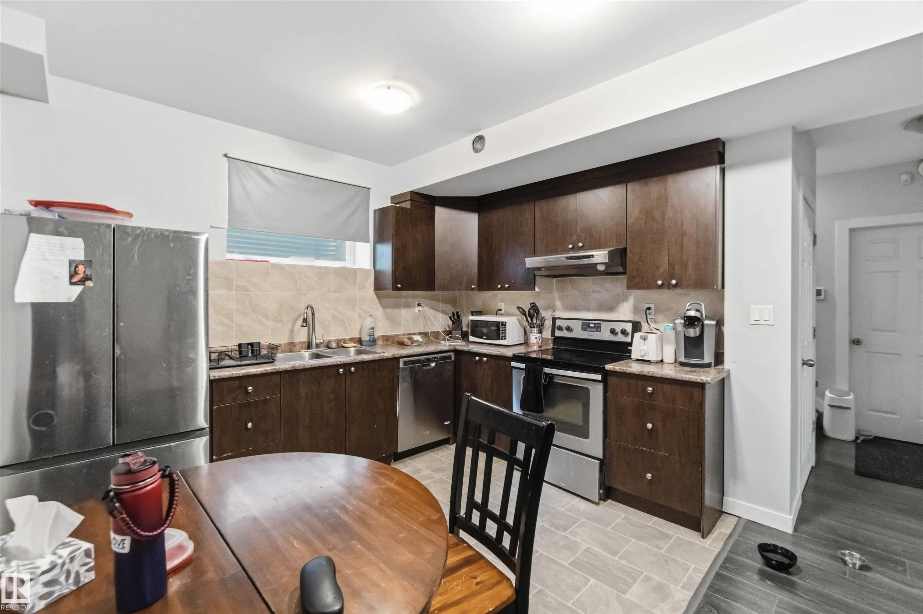 3563 14 Street, Edmonton, AB - Indoor Photo Showing Kitchen With Double Sink