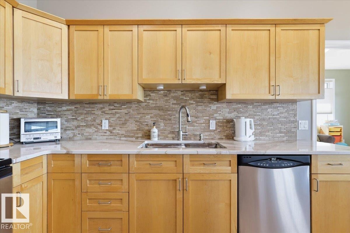 72 Beach Ave, Rural Leduc County, AB - Indoor Photo Showing Kitchen With Double Sink