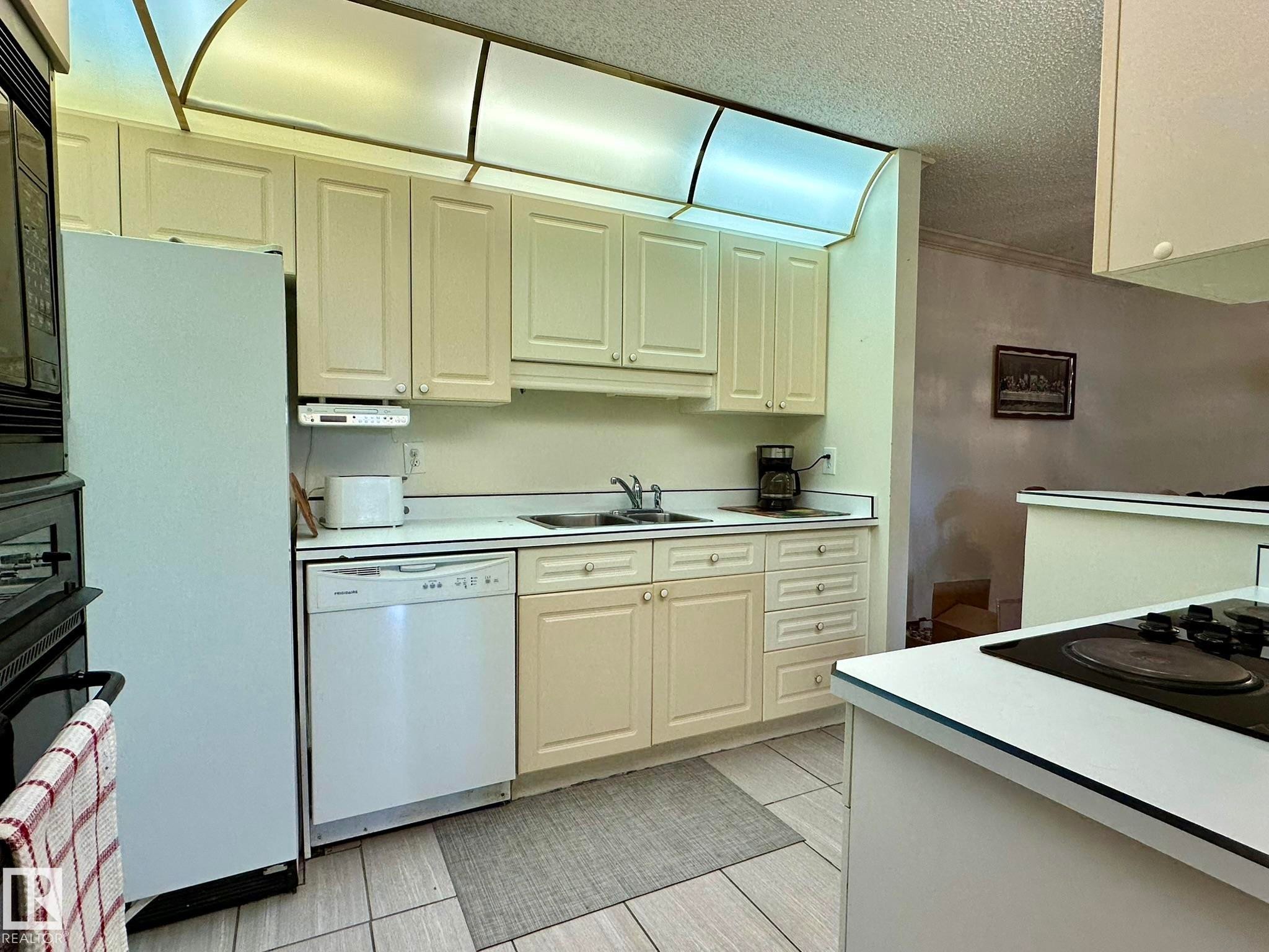 2304 151 Avenue, Edmonton, AB - Indoor Photo Showing Kitchen With Double Sink