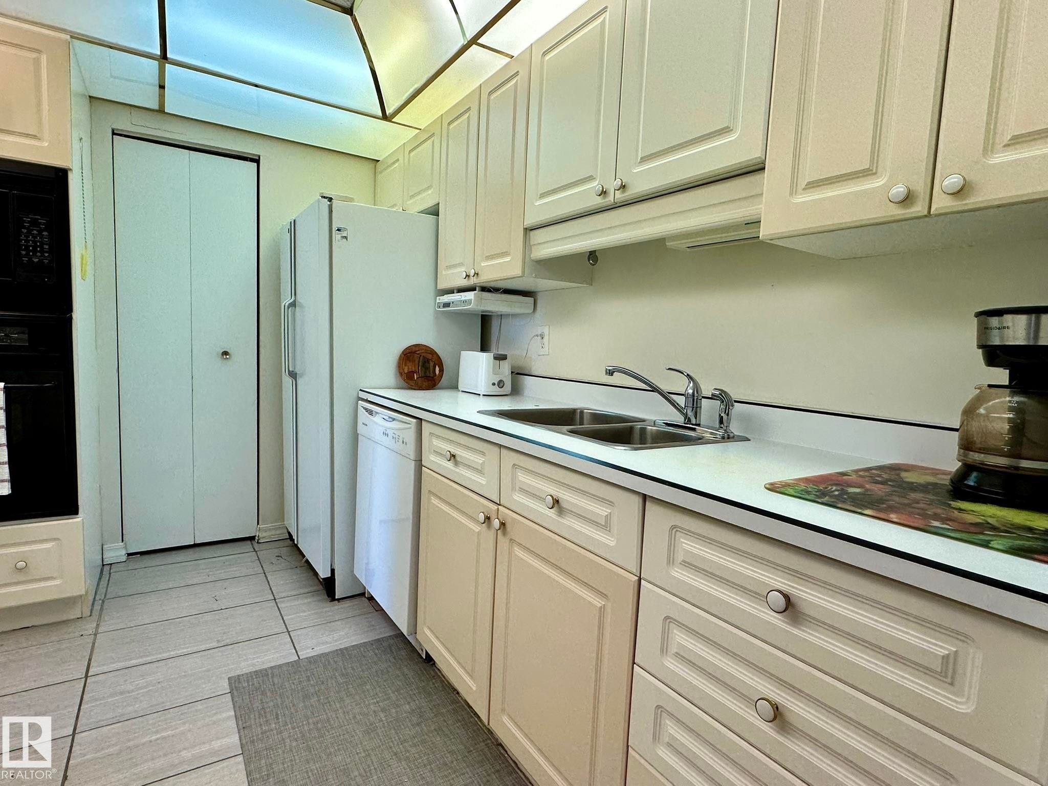 2304 151 Avenue, Edmonton, AB - Indoor Photo Showing Kitchen With Double Sink