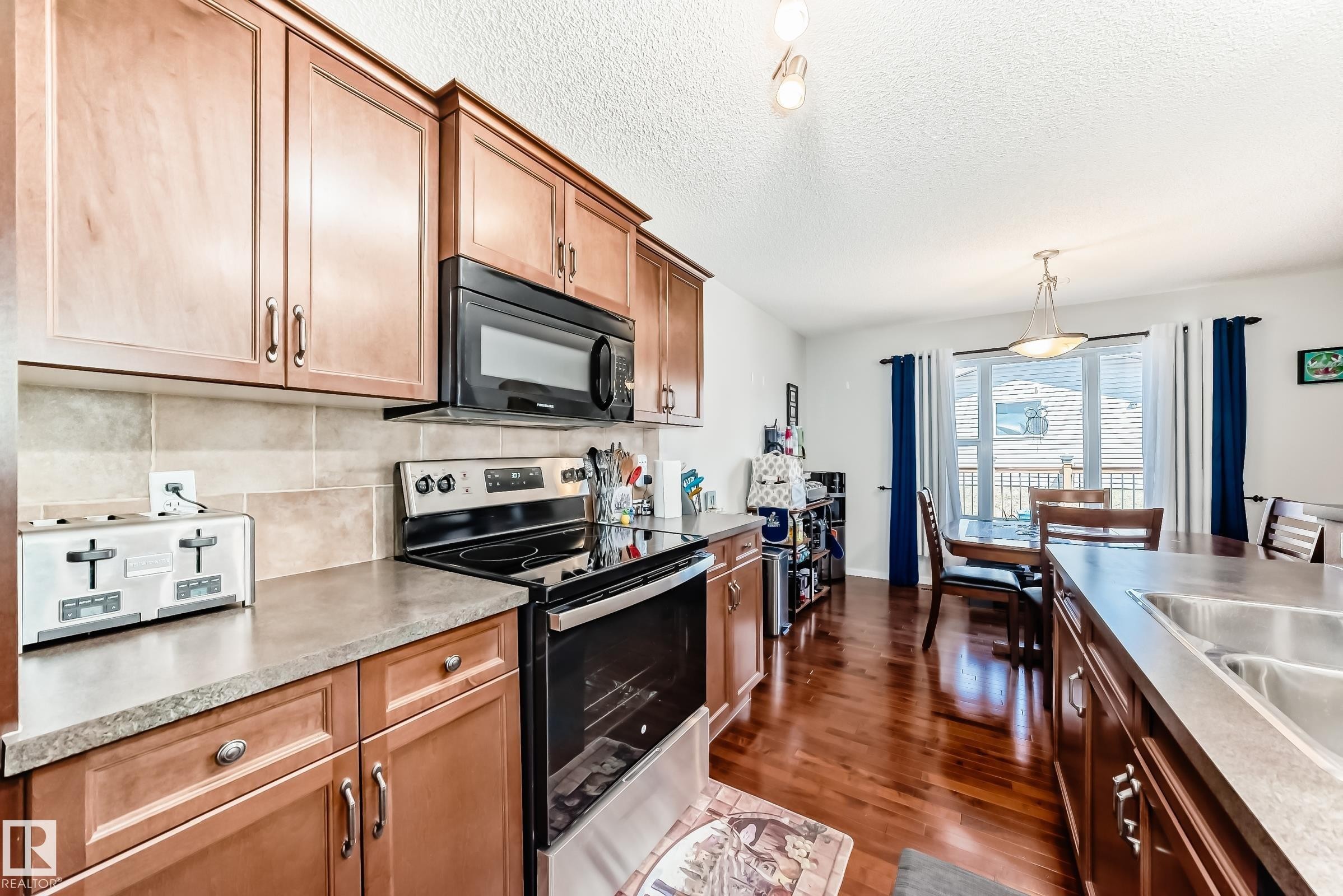 115 60 Street, Edmonton, AB - Indoor Photo Showing Kitchen With Double Sink