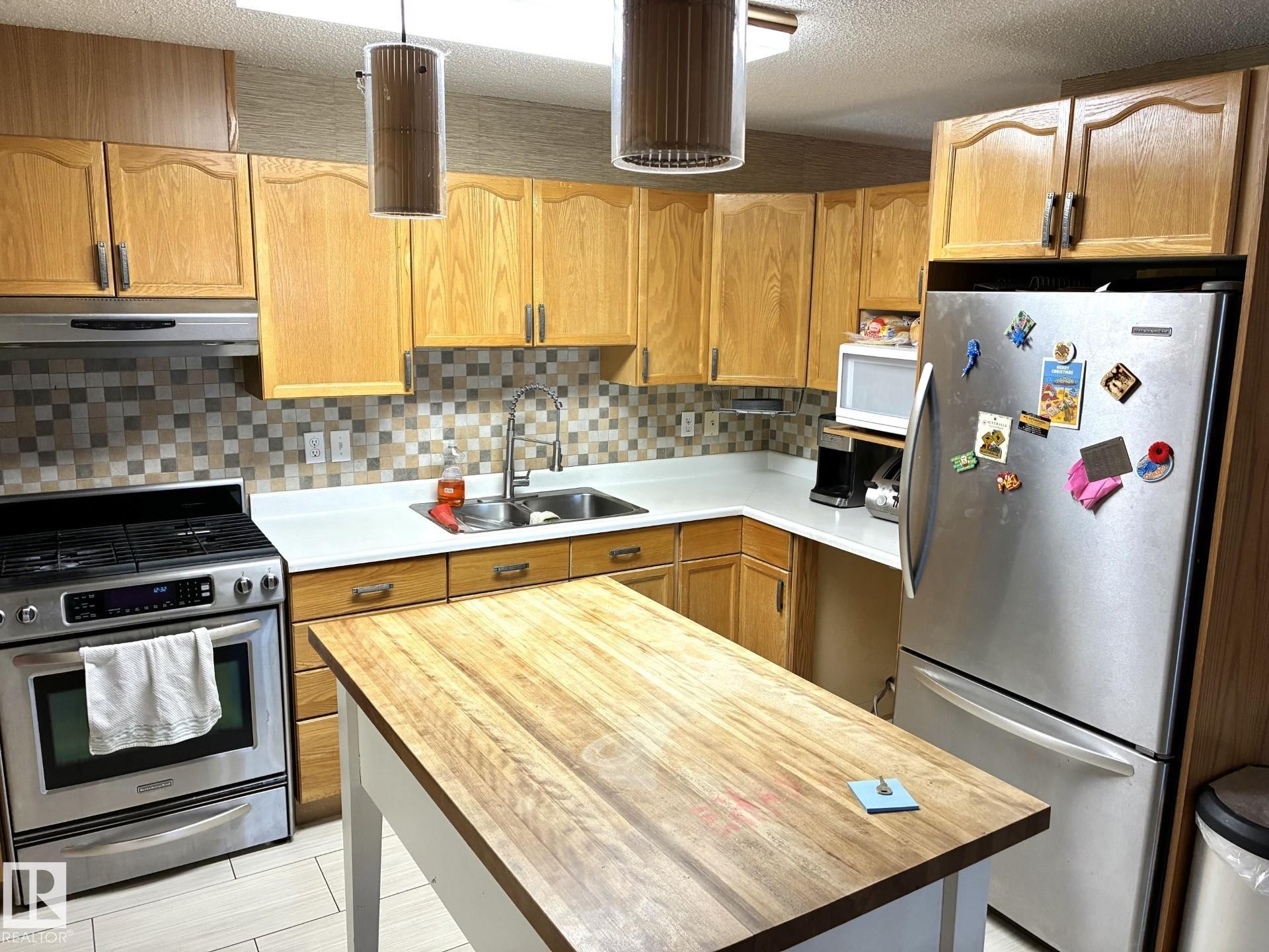 1248 48 Street, Edmonton, AB - Indoor Photo Showing Kitchen With Double Sink
