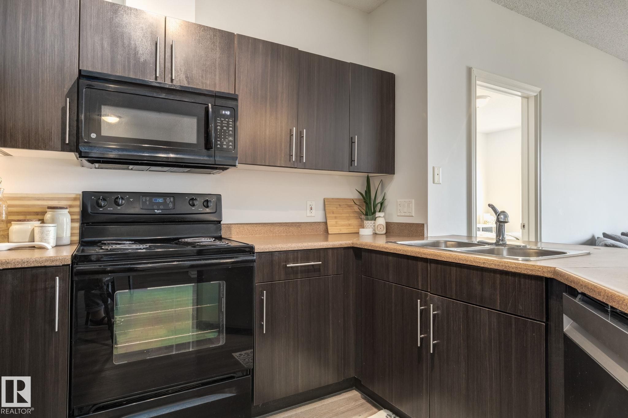 235 263 Macewan Road, Edmonton, AB - Indoor Photo Showing Kitchen With Double Sink
