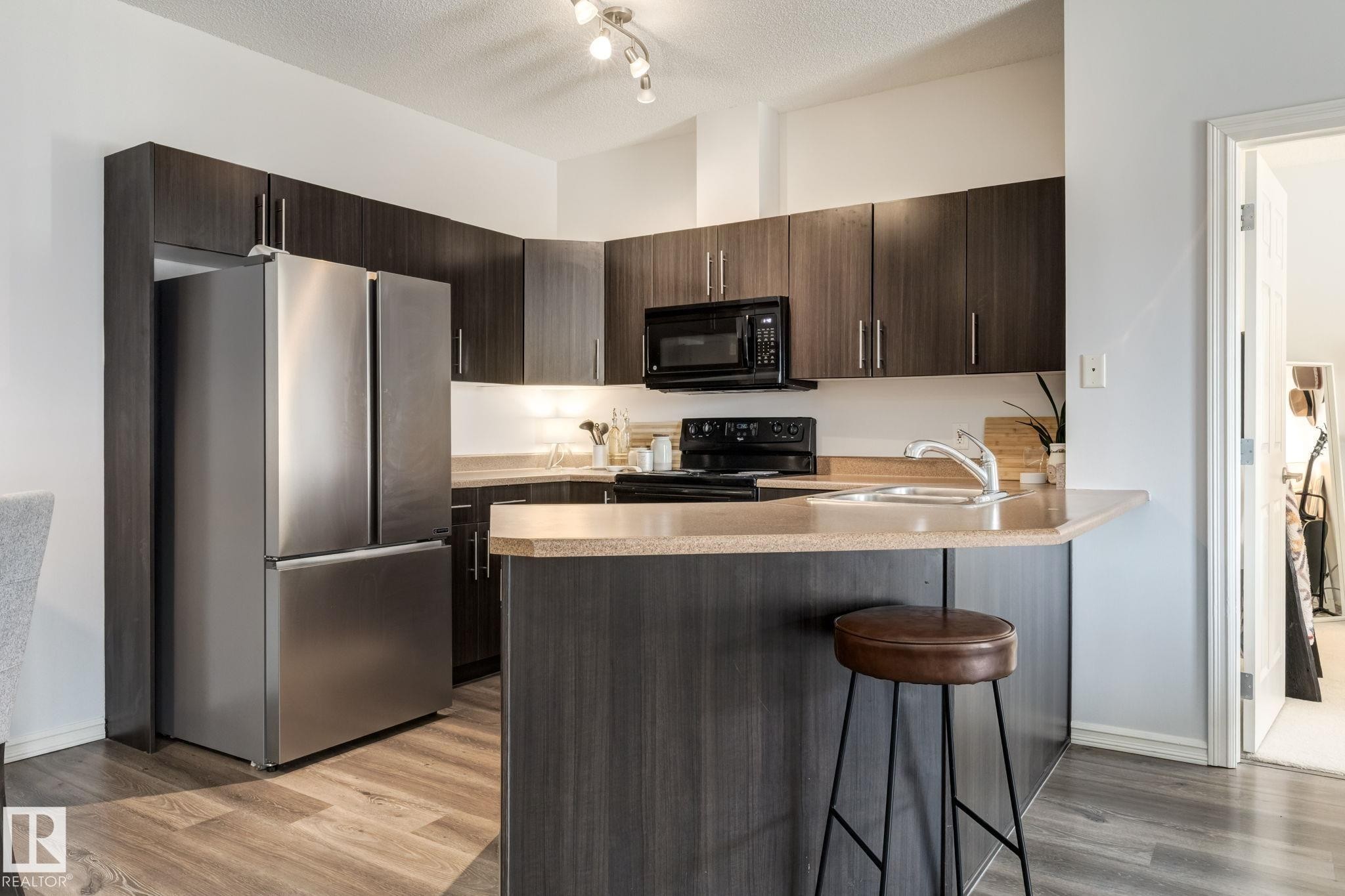 235 263 Macewan Road, Edmonton, AB - Indoor Photo Showing Kitchen With Double Sink