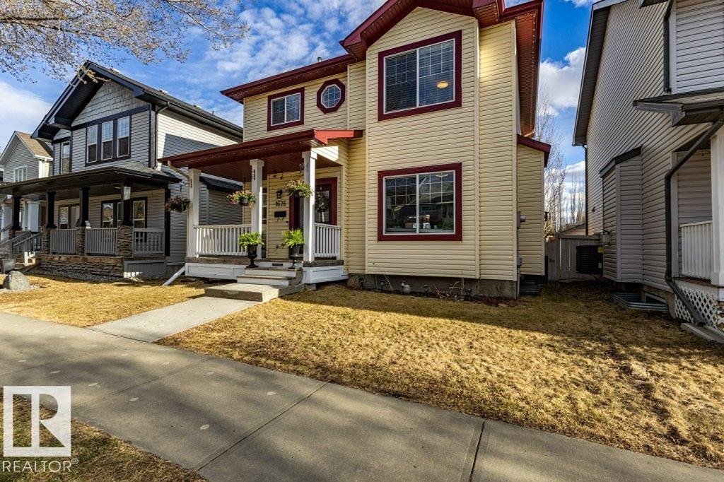 1676 Tomlinson Common, Edmonton, AB - Outdoor With Deck Patio Veranda With Facade