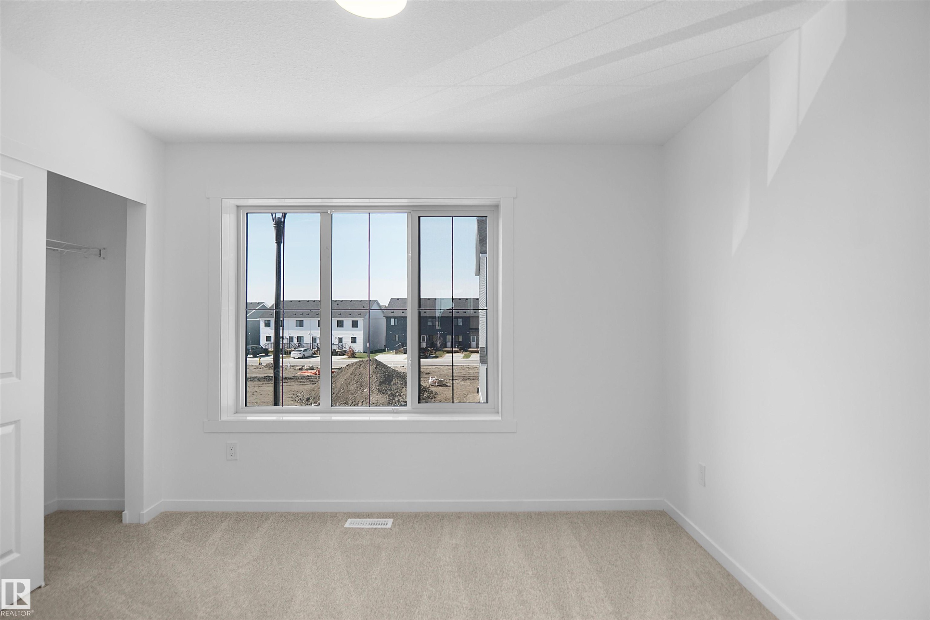 111 1009 Cy Becker Road, Edmonton, AB - Indoor Photo Showing Other Room