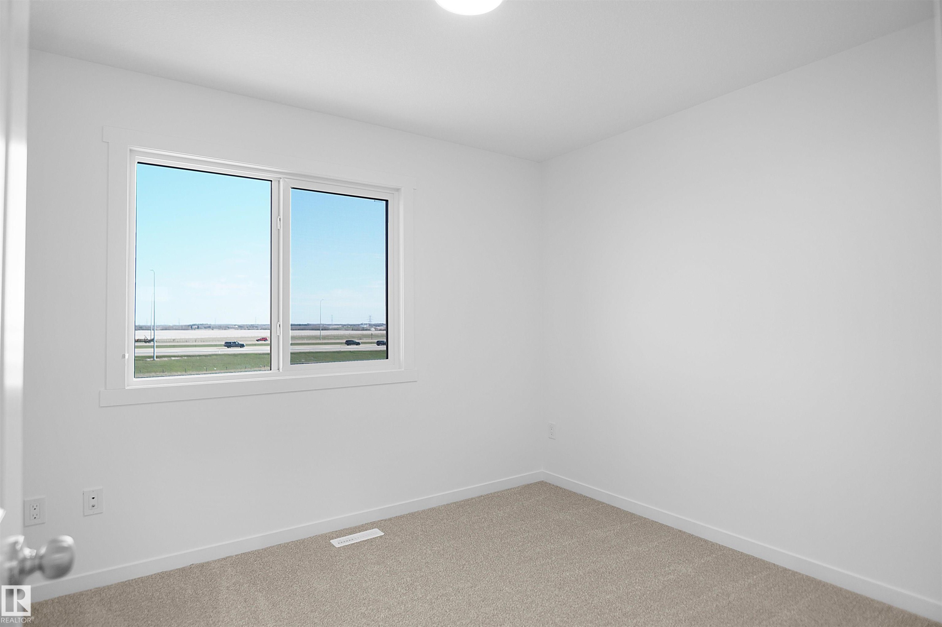 111 1009 Cy Becker Road, Edmonton, AB - Indoor Photo Showing Other Room
