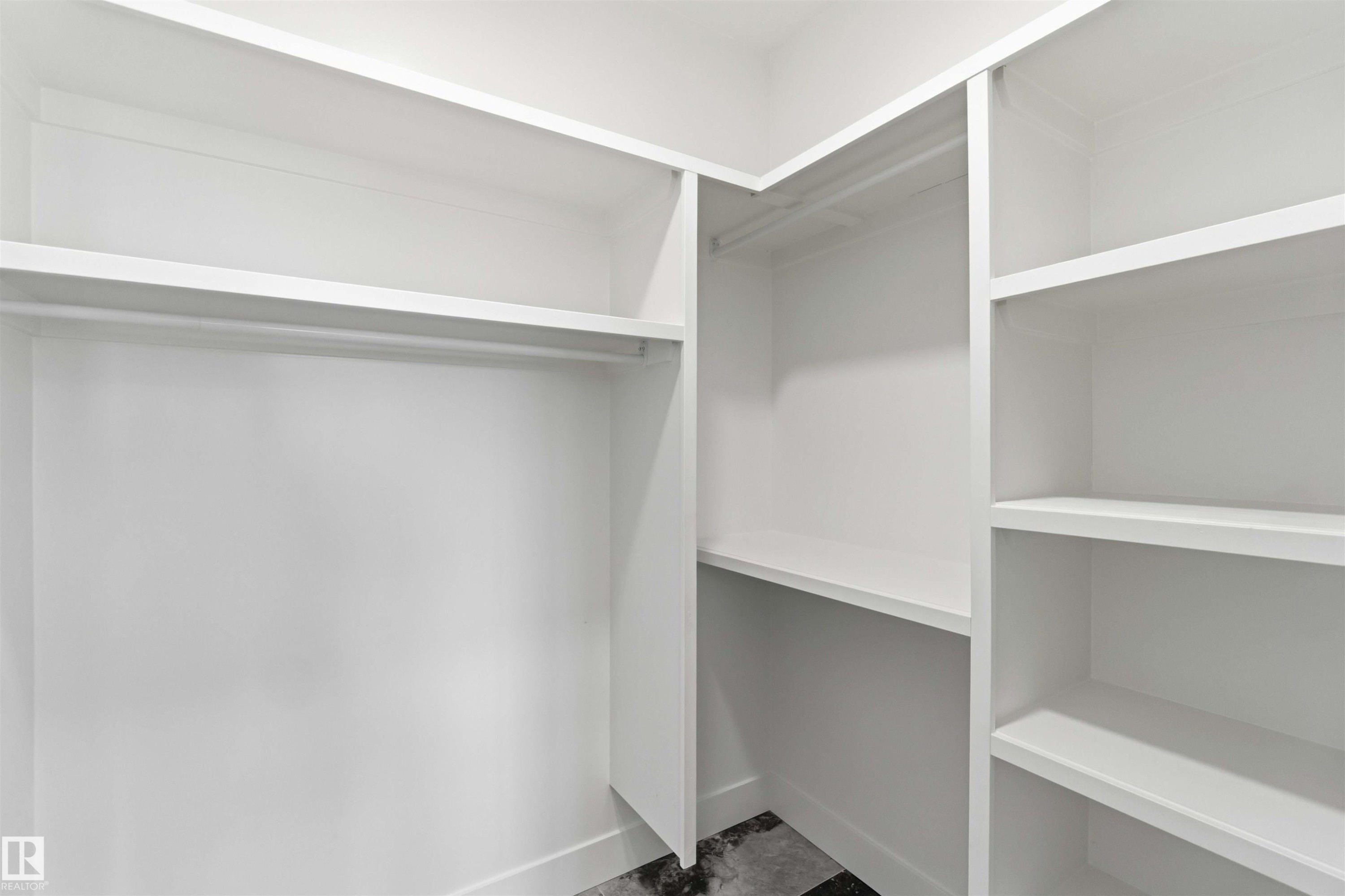 Walk in closet - 415 Pine Point(E), Leduc, AB - Indoor With Storage
