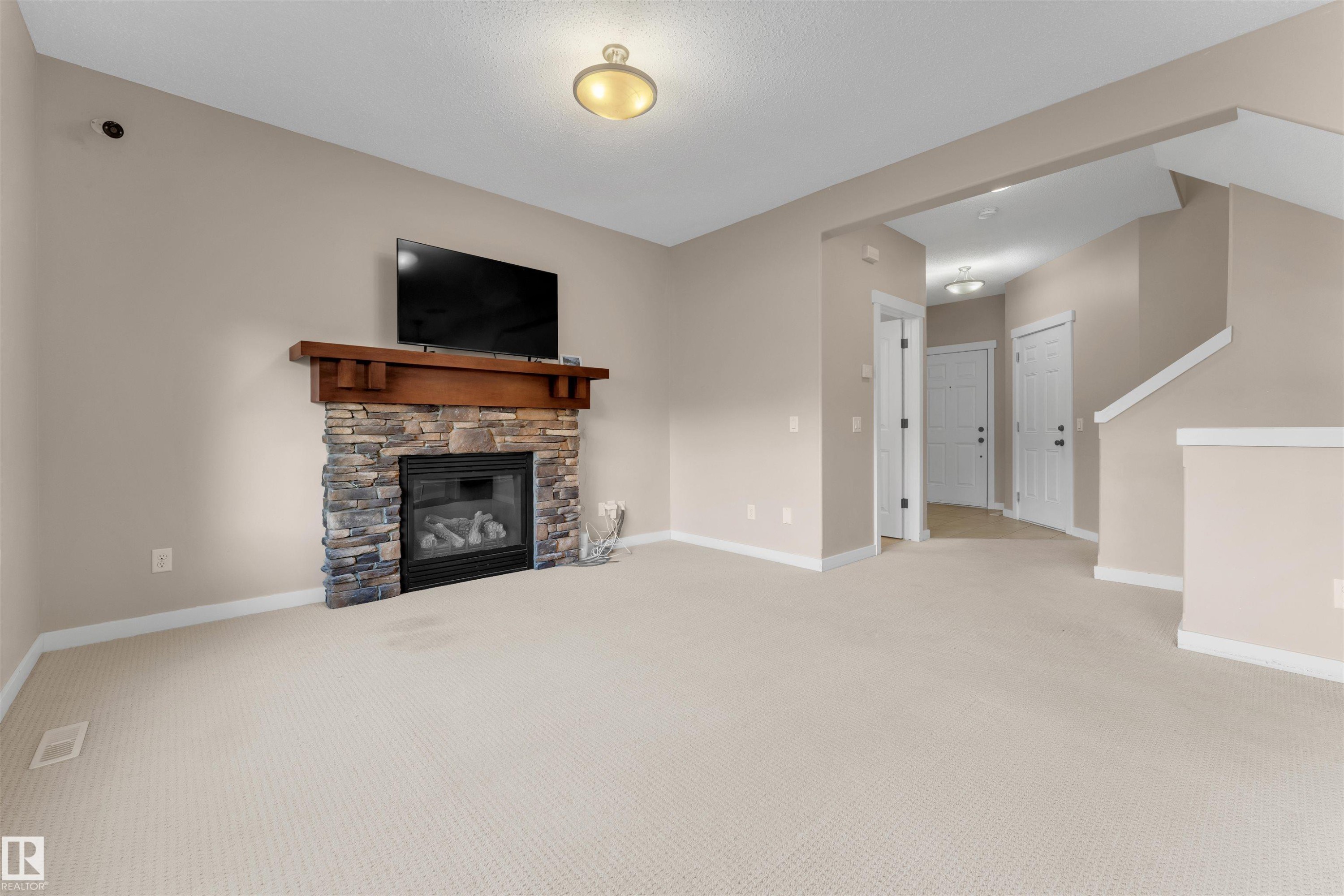 3650 13 Street, Edmonton, AB - Indoor Photo Showing Other Room With Fireplace