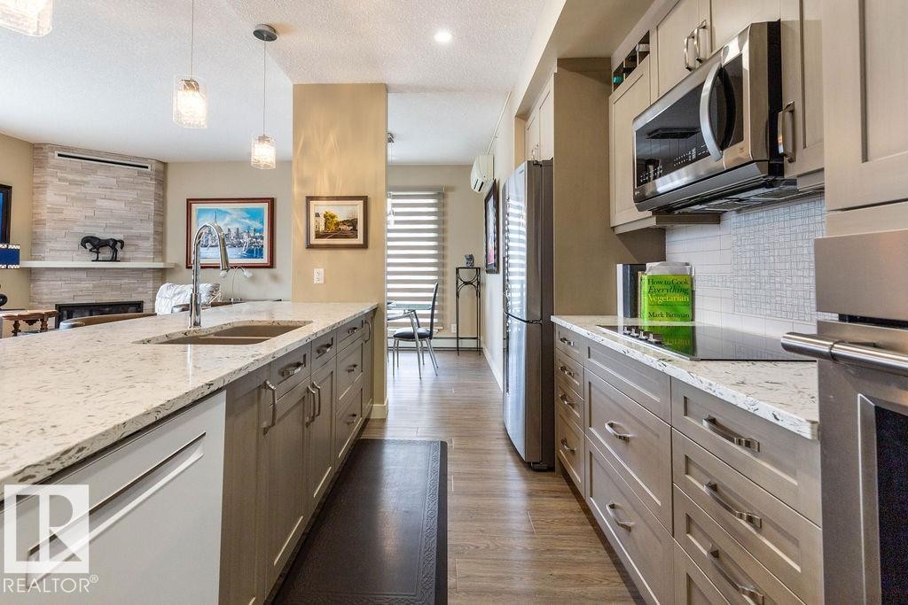301 9707 105 Street, Edmonton, AB - Indoor Photo Showing Kitchen With Double Sink With Upgraded Kitchen