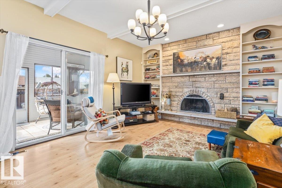 2446 78 Street, Edmonton, AB - Indoor Photo Showing Living Room With Fireplace