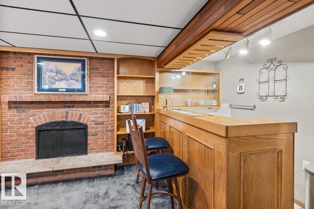 2446 78 Street, Edmonton, AB - Indoor Photo Showing Other Room With Fireplace