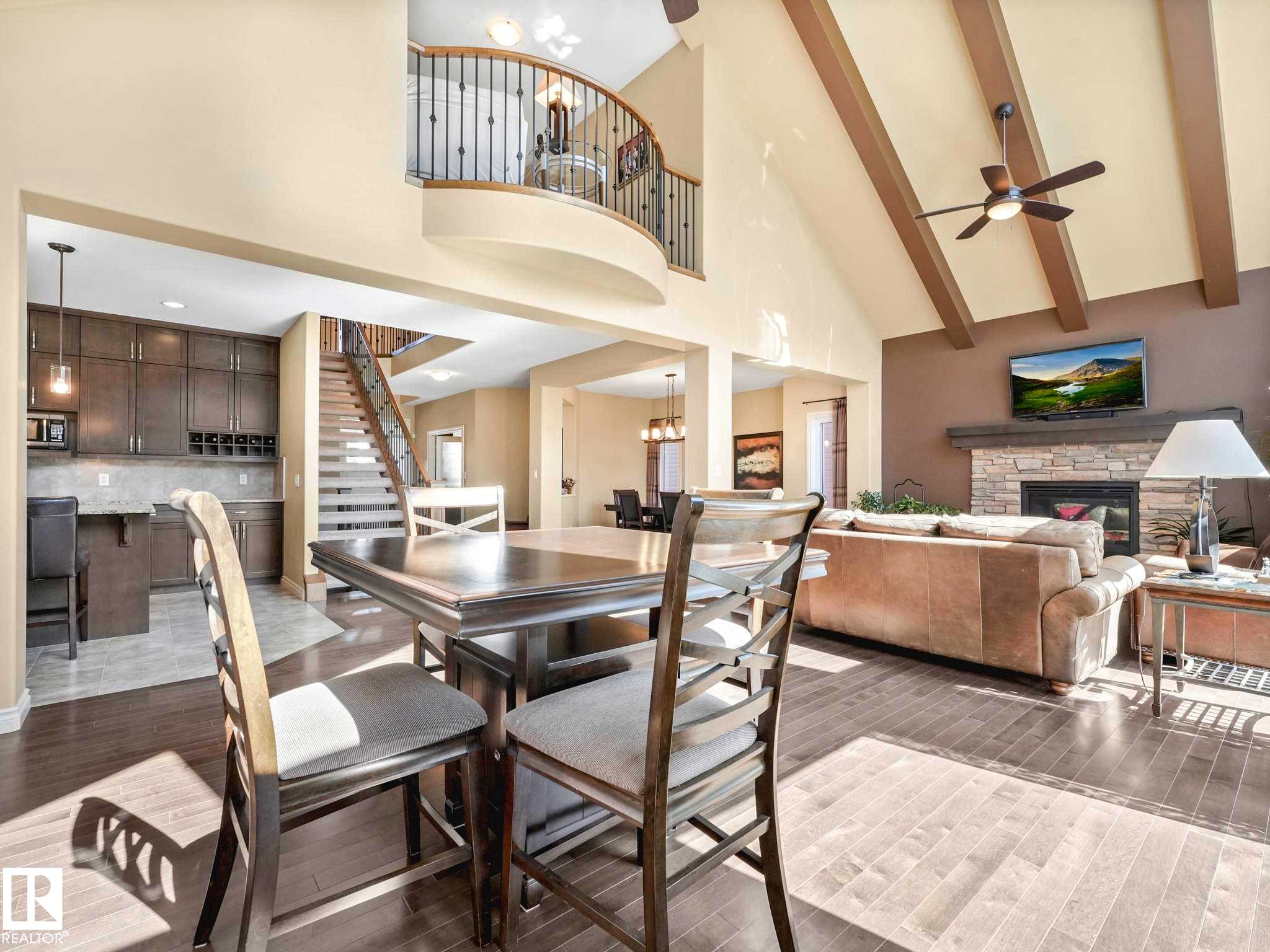 3441 West Landing, Edmonton, AB - Indoor Photo Showing Dining Room With Fireplace