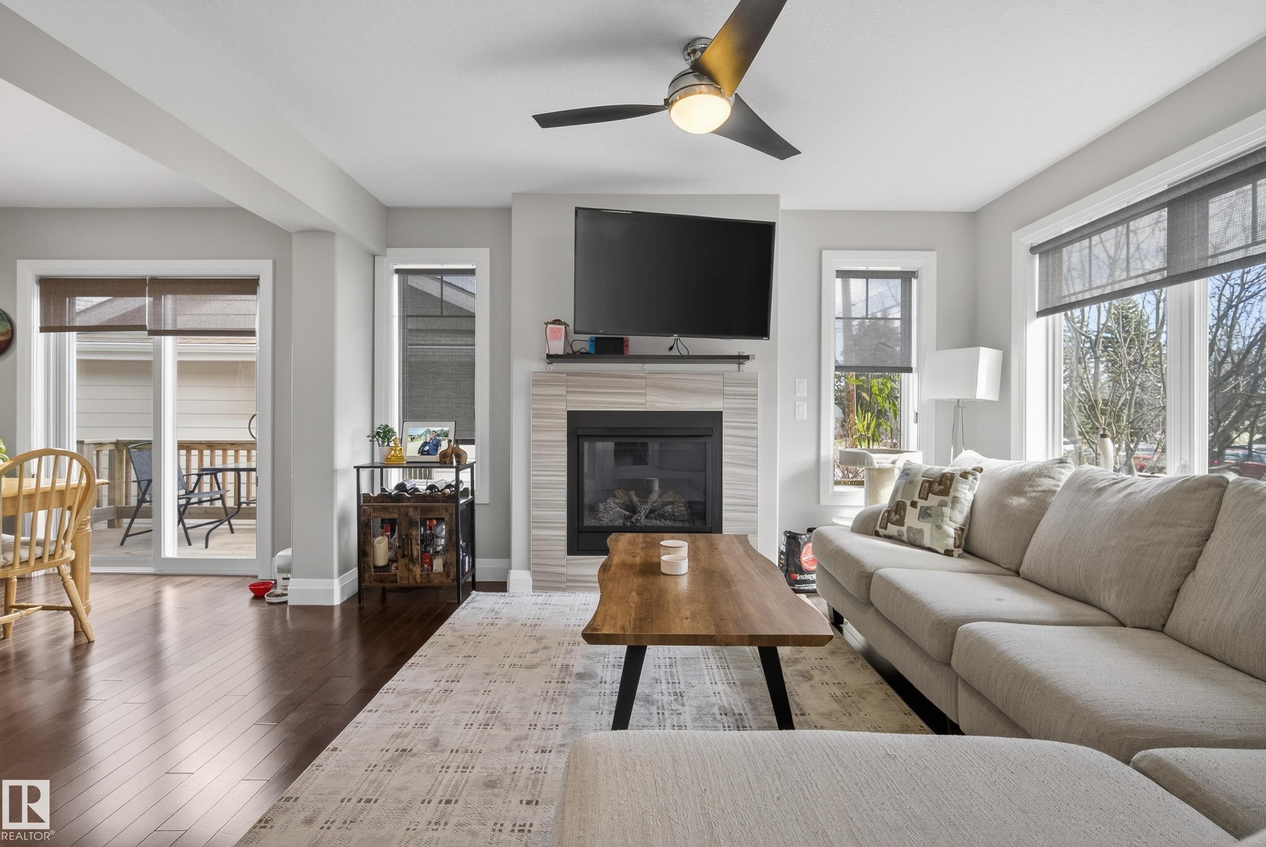 7008 97 Street, Edmonton, AB - Indoor Photo Showing Living Room With Fireplace