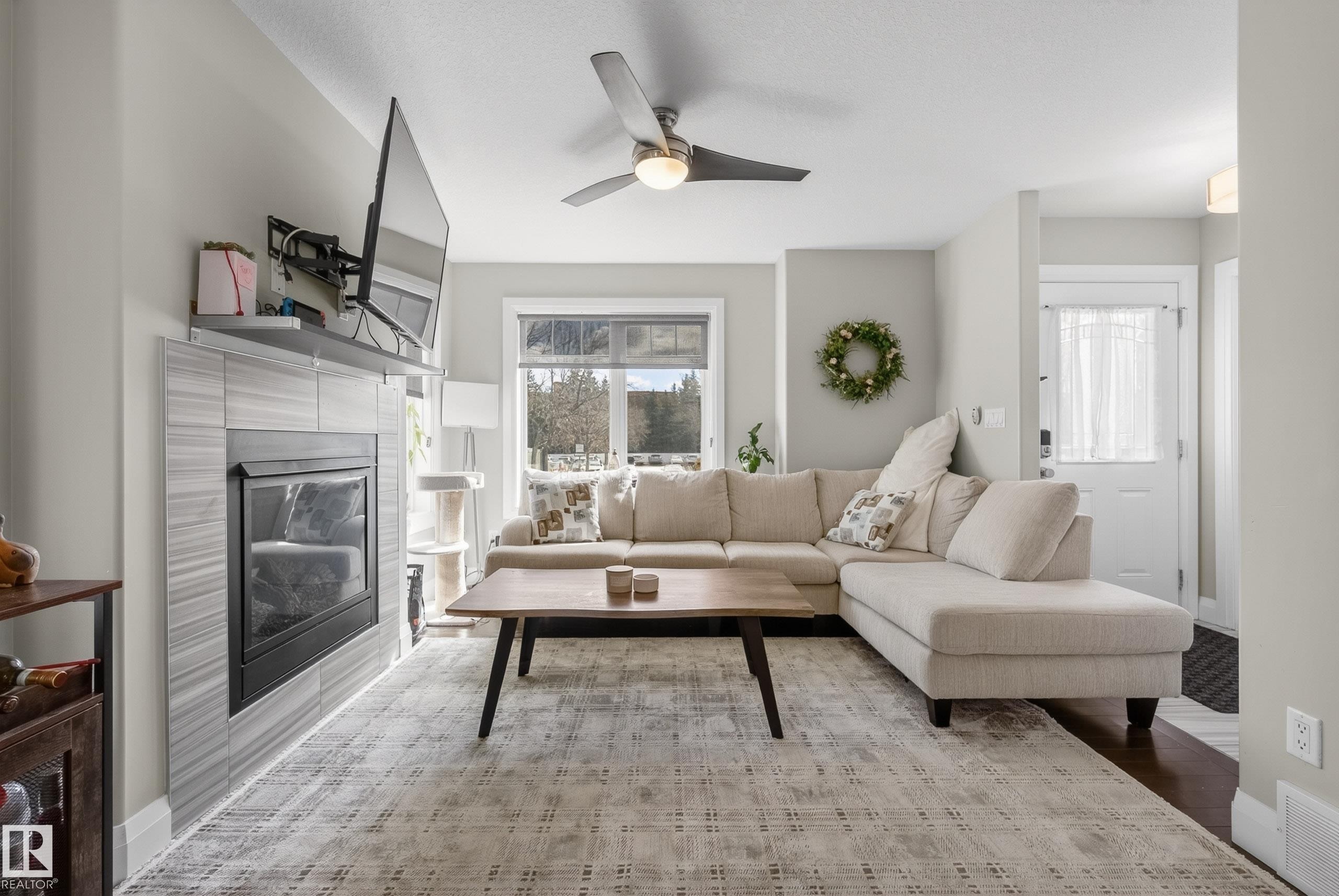7008 97 Street, Edmonton, AB - Indoor Photo Showing Living Room With Fireplace