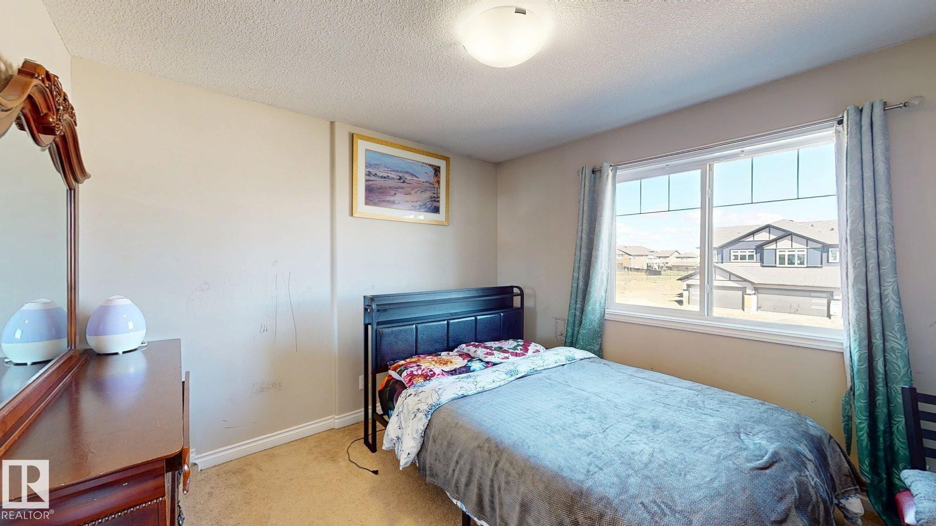 4017 41B Ave, Drayton Valley, AB - Indoor Photo Showing Bedroom