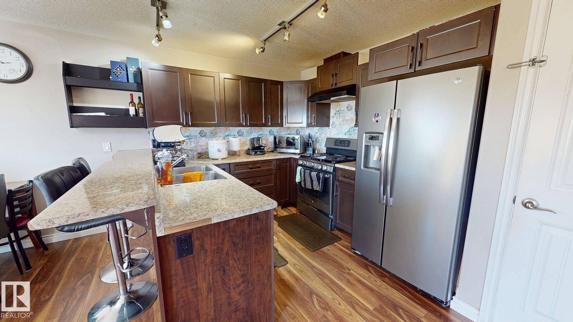 4017 41B Ave, Drayton Valley, AB - Indoor Photo Showing Kitchen With Double Sink