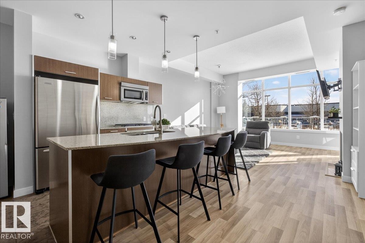 #114 2504 109 St Nw, Edmonton, AB - Indoor Photo Showing Kitchen With Stainless Steel Kitchen With Upgraded Kitchen