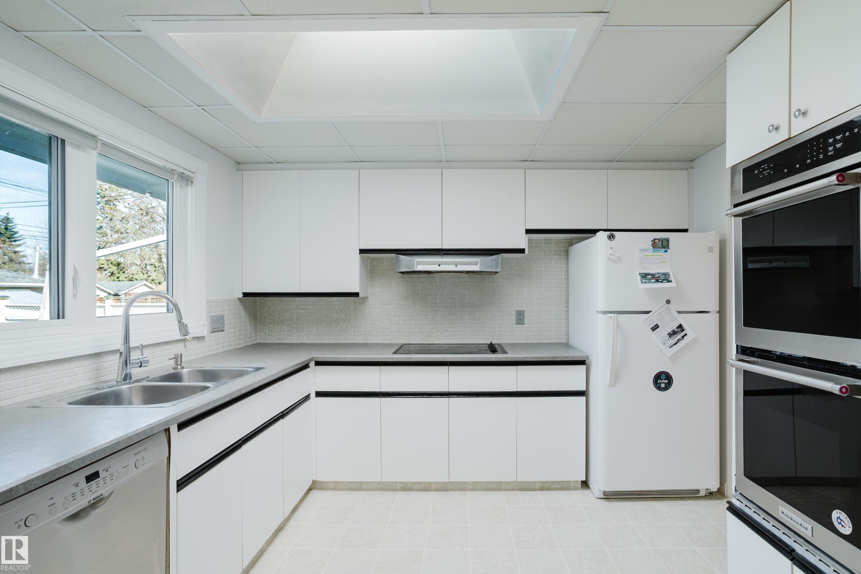 7108 83 Street, Edmonton, AB - Indoor Photo Showing Kitchen With Double Sink