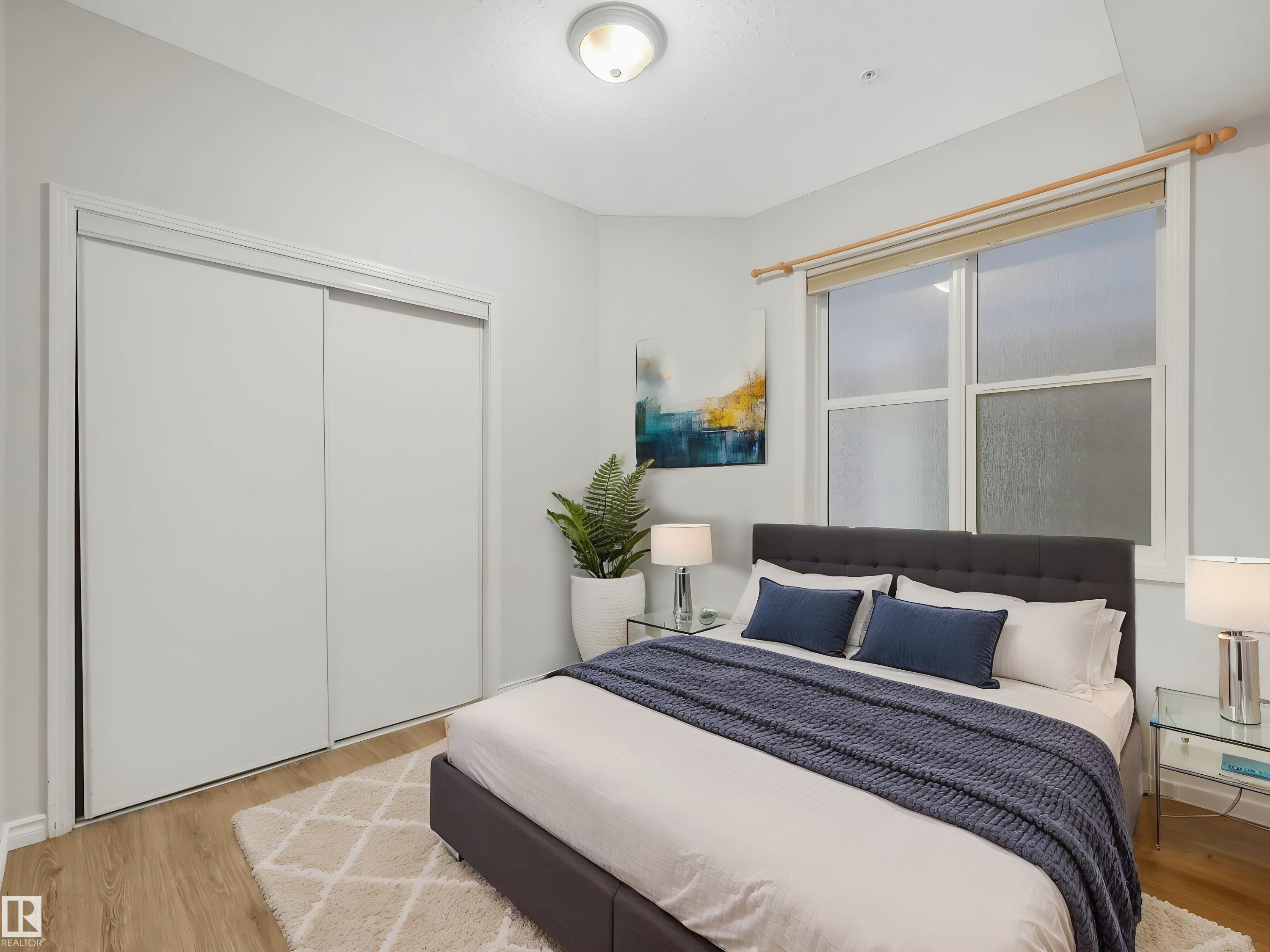 virtually staged - 112 11039 83 Avenue, Edmonton, AB - Indoor Photo Showing Bedroom