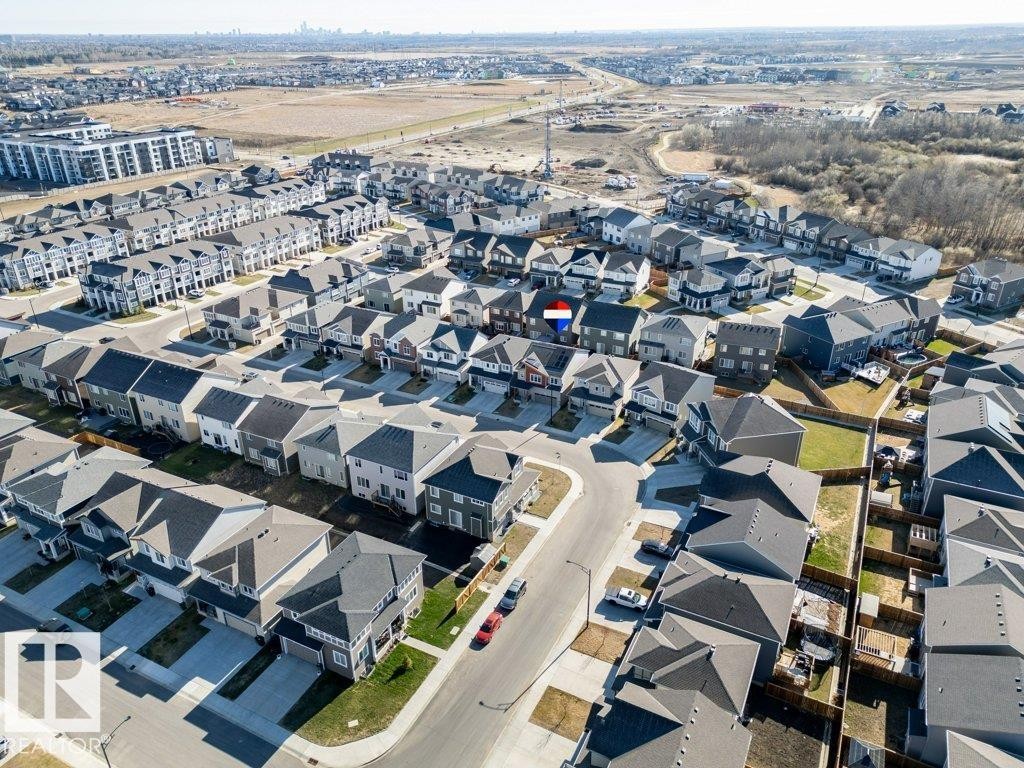 Aerial perspective showcasing a residential development with multiple detached and attached homes - 2011 207 Street, Edmonton, AB - Outdoor With View